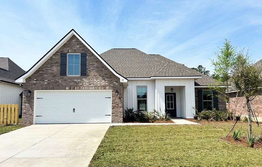 Awesome builder rate plus FREE front gutters. Restrictions apply.The ROSES V G in Starburst at Hammock Bay community offers a 3BR, 2BA, open design with flex space and computer desk/niche. Upgrades added (list attached). Features: double vanity, garden tub, separate custom tile shower, and 2 walk-in closets in master bath, tray ceiling in master bed, kitchen island, walk-in pantry, covered porches, crown molding, recessed lighting, smart connect WIFI thermostat, smoke and carbon monoxide detectors, landscaping package, architectural 30-year shingles, flood lights, and more!Energy Efficient Features: water heater, electric kitchen appliance package, vinyl low E windows, and more! Energy Star Partner.