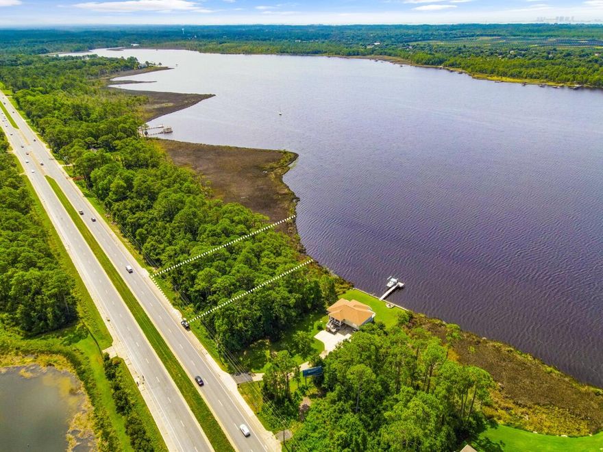 Don't miss this opportunity to own a beautiful 100' waterfront lot on East Bay in Navarre! Enjoy fishing, boating, swimming and amazing sunsets. Beautiful  location to build your dream home on the water! Conveniently located to some of the best attractions, restaurants and shopping in Navarre. Approx 5 minutes to Publix. Approx 11 mins to Navarre Beach. Approx 4 mins to Eglin AFB. Recently installed driveway apron. Delineation has been performed with uplands identified. See documents for permitting quote and survey. With acceptable offer seller will provide a credit at closing towards the permitting quote.