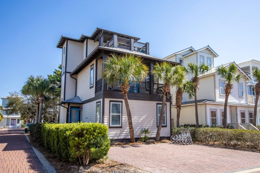 This charming home is ideally located in the sought-after Seacrest Beach community along the picturesque Scenic Highway 30A, perfectly positioned between the iconic Rosemary Beach and Alys Beach. The ground floor includes a spacious kitchen and living area, as well as a junior master suite. On the second floor, you'll find the expansive master suite with a large master bath, along with another junior master suite. The third floor features a second living area with a full bath, wet bar, and a large deck with ample seating, plus an additional bedroom. This fully furnished home boasts beautiful hardwood floors throughout. Seacrest Beach is a beloved destination for 30A visitors, offering a 12,000-square-foot resort-style pool, scenic walking trails, and convenient tram service to the beach.  You can also enjoy the vibrant shops and restaurants of Seacrest, Alys Beach, Rosemary Beach, and 30Avenue, all just a short walk away.