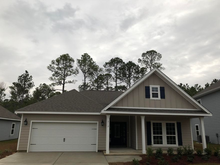 MOVE IN READY! This 3 bedroom ranch with open concept is our most sought after home. Cute covered front porch with craftsman style pillars, wide open entrance with tray ceilings will feel inviting the moment you enter. Family room is open to kitchen separated only by large island with bar seating. The colors are light and bright, and features many windows to showcase the natural light. Master bedroom is very spacious with walk-in closet and large master bath featuring 5 ft. tiled shower with bench seat, soaking garden tub and water closet. Don't forget about the 2 car garage and ample storage throughout. Let this new home become your beach home away from home, investment or great primary residence! Also, coming soon is our community pool in the Spring. Come visit today!