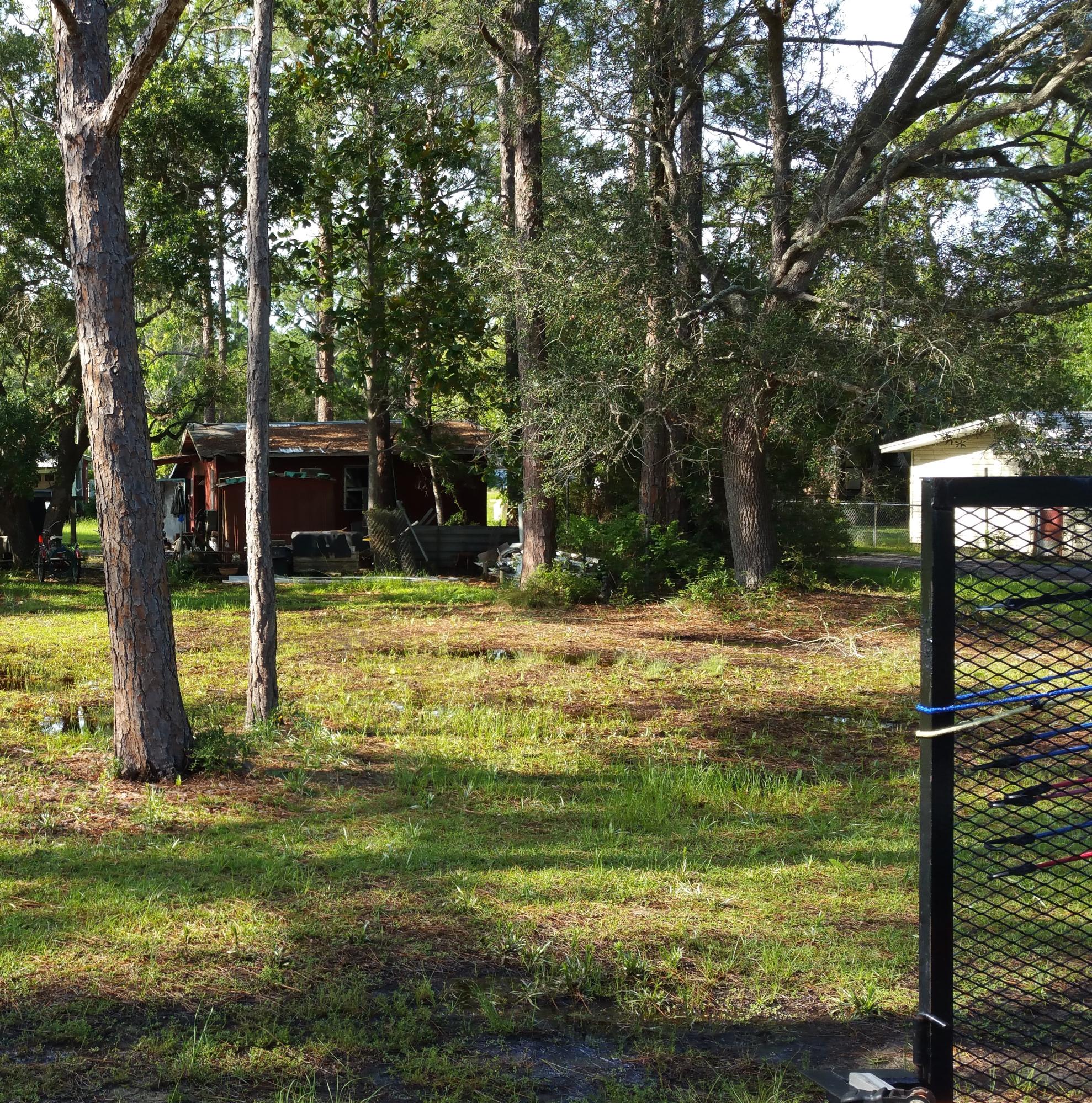 Beautiful vacant lot just outside of Niceville. Ready for your new home! Garage on a cement slab, needs work, is being sold as with no value given to it. Lot 8 is also available for purchase.
