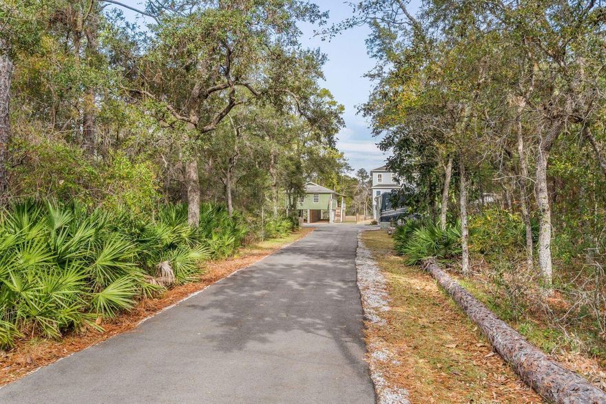 Privacy in the Cul-de-sac and easement access makes this homesite extra special. Non HOA unrestricted. Location ideal... minutes to most shopping, schools, Hwy 98, New Bay Beach and 83A Public Beach access. Privacy and minutes to The Beach... Water tap fee Paid -