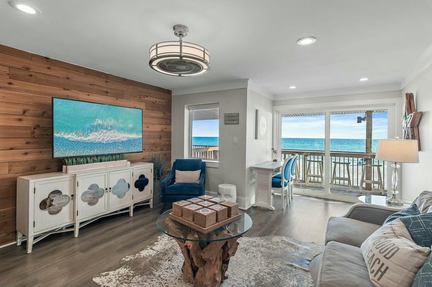 Positioned directly on the sugar-white sands of Walton County, this exceptional three-story townhome in Costa Del Sol captures breathtaking gulf views from every level. Thoughtfully remodeled and professionally furnished, this turn-key retreat offers a prime investment opportunity with a strong rental history and sleeping accommodations for up to 12 guests. Upon entry, the main living area showcases floor-to-ceiling gulf views, complemented by designer furnishings and an inviting, open floor plan. The adjacent dining space features a custom-built booth that blends seamlessly with the sleek, modern kitchen outfitted with stainless steel appliances, ceiling-height cabinetry and pristine white countertops. The ground floor presents a private mother-in-law suite, accessible from the beach level porch, making it an ideal setup for multi-family stays. This level includes a second living area with a sectional sofa, flatscreen TV, bar, and built-in twin bunk, along with a spacious bedroom featuring a king bed, twin bed and twin trundle. The boardwalk leads directly to the beach access, ensuring uninterrupted coastal views. On the top floor, two king suites with private bathrooms provide luxurious accommodations. The primary suite boasts a private balcony, offering a front-row seat to mesmerizing gulf sunsets. Each bathroom is equipped with upgraded rainfall showerheads and high-end finishes, delivering spa-like comfort. Recent updates include new shower enclosures, two HVAC units, and a new microwave, ensuring modern efficiency. Centrally located between Pompano Joe's and Frangista Beach, this townhome is just moments from renowned gulf-front dining, boutique shopping and premier entertainment. With a high-performing rental history and exceptional design, this is an investment-worthy retreat that redefines beachfront living. With rental history and rental projections ranging from $64,000-$114,000, depending on owner usage, this one is a fantastic opportunity for any gulf-front buyer.  The voluntary HOA includes management, internet and pest control.