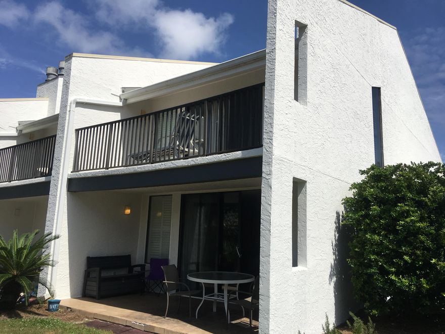 Seller is willing to consider back up offers.  This beautifully updated end unit  townhome is the only one currently available for sale at Mainsail. Open floor plan, stainless appliances , and quality cabinets make this kitchen stand out.   Custom showers, pedestal sinks, and granite topped vanities in the bathrooms. Multiple skylights provide plenty of natural light.  Upstairs bedrooms have private balconies.  Outdoor storage area with shower is a great place to keep all your beach toys and helps keep sand outside. Bonus room and hallway bunks. Sleeps 11. Perfect for family vacations and cashing in on rentals. Carport and laundry room with full size washer and dryer , and a 2nd fridge. No waiting for elevators or searching for parking. Guard gate. Furnished, some pictures not included