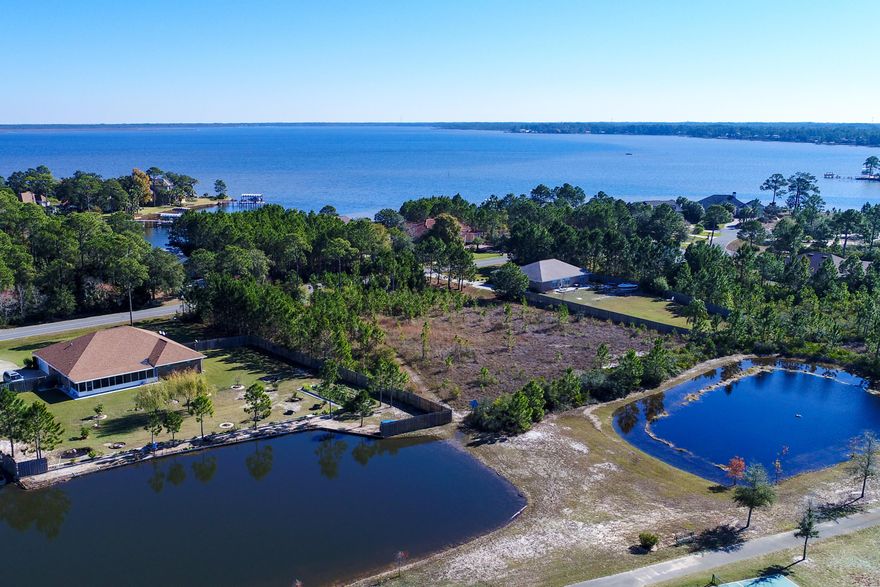Build your dream home on this large residential, protected lot, directly across from Choctawhatchee Bay in the sought after neighborhood of Driftwood Estates. With no build-out time requirement, this spacious property, located in flood zone AE, also backs up to tennis and basketball courts, county park, and playground. Plenty of room for a pool, this home site is near schools, Sacred Heart Hospital, shopping, dining, world class golf and the beaches of South Walton county. Prime location at affordable price!
