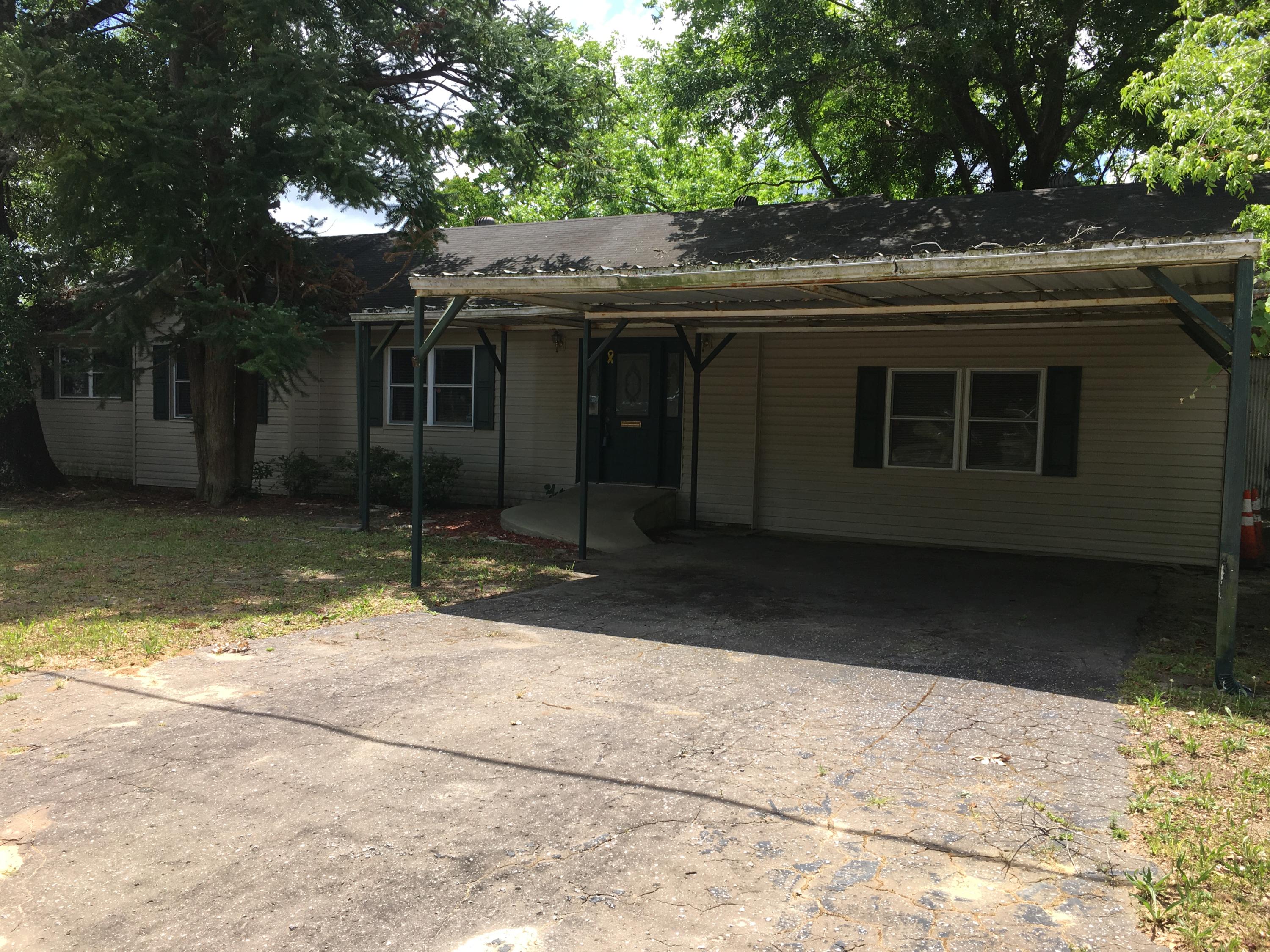 PRICE REDUCEDSeller ready to move this property.Great Location for office space. One block west of 85 & 1/4 Mile North of 90.Could possibly be used as a residence with company office combined. (WITH CITY APPROVAL)1860 Sq/ft with out building for additional storage space.