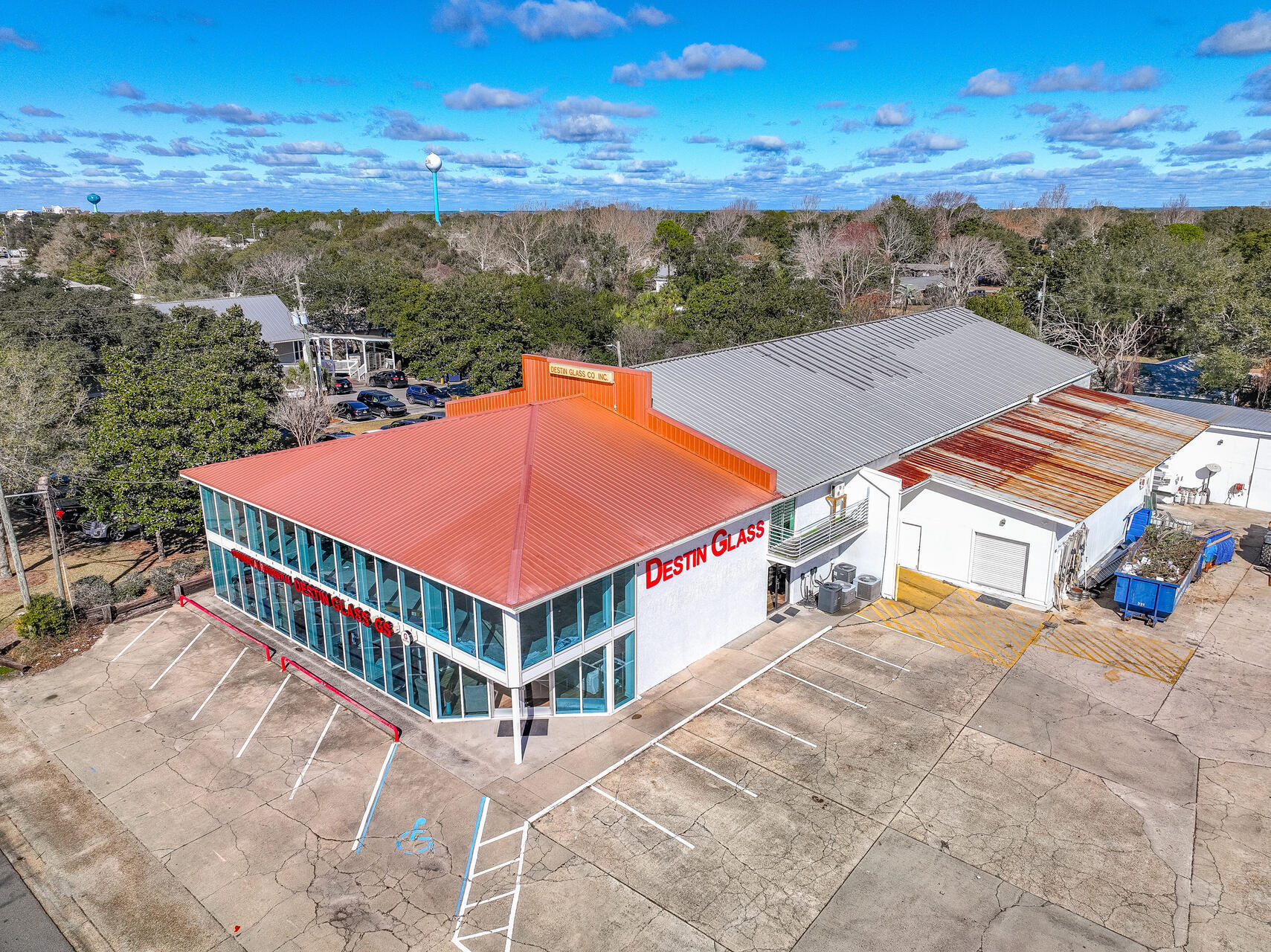 Extraordinary, 'irreplaceable' building located on a prime site in the heart of Destin, Florida's Scenic Harbor District.  This opportunity is comprised of a two-story retail, showroom, and office building, as well as an attached warehouse.  Exceptional visibility, ingress/egress, and convenient logistics reinforce the value of this rare opportunity.  Please inquire for further details and to schedule a private showing.