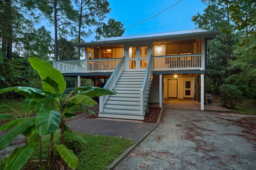 HOME IS UNDER CONTRACT AND ACCEPTING BACK UP OFFERS!New Hot-tub is included, inside one of two private screened-in areas! This truly unique home is set on a wooded lot off a private drive and is like no other in Santa Rosa Beach! You will Not find another one like it at this price! 2018 updates include a new roof, all new vertically mounted Hardie board siding on 24'' centers - including all new Hardie soffits and eves. All New decking and New stairways with beautifully crafted handmade tongue and groove rails. A small fenced-in pet area that connects to the upper covered porch. All new exterior paint. The screened in areas are finished with beautiful Handmade Cedar French doors. The home is safe - built high on pilings. Dual carports un ...designed to back a hitched boat and truck directly under the home after a day on the water. Small workshop with built-in work bench. Two bedrooms, two full baths upstairs with vaulted ceilings in the main living area. Third bedroom downstairs is currently used as a guest room, but could easily be converted into a theater room or a small business workshop or office with plenty of power outlets. Only 1/2 mile to public boat launch and four miles from the beach. It has been well loved by the current owner and HVAC and all kitchen stainless appliances were replaced a little over five years ago. Washer and dryer are also included!