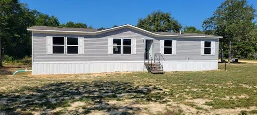 Beautiful new 4BR/2BA home ready for you and your family to enjoy. Great location that is convenient to Crestview, Niceville, and DeFuniak Springs. You will enjoy the split bedroom design. This model, manufactured by Southern Energy, offers a spacious living/dining area and has a well-designed floor plan made for that growing family. This home qualifies for FHA/VA financing to a qualified buyer. Take advantage of the 'Hometown Hero's' program with substantial attractive features. The new home has a Manufacturer's Warranty. Closing to be at Mitchell Land & Title with convenient locations in DeFuniak Springs and Freeport.