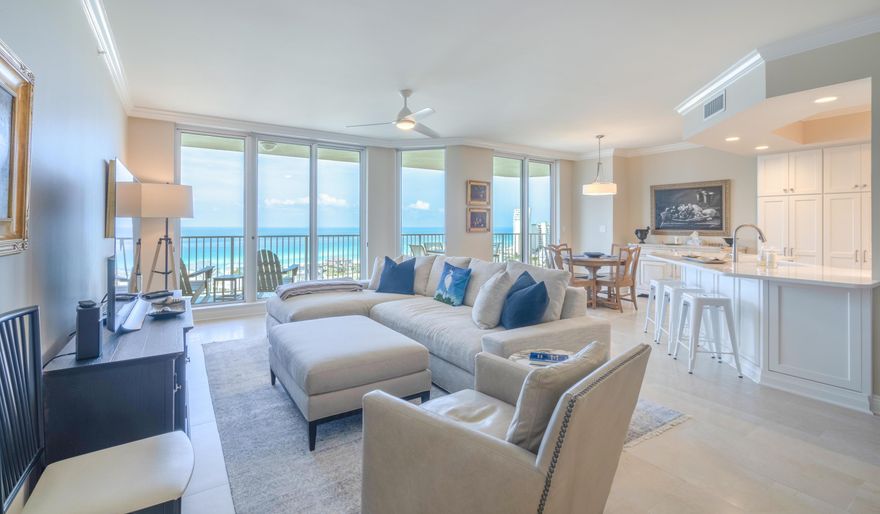 Exquisite 15th floor resort condo home with panoramic views of the gulf and bay! Deeded golf cart space & garage space included! Professionally remodeled from floor to ceiling by Compass Builders/Terry Jones. All new kitchen, bathrooms, flooring, appliances, lighting etc. Enjoy floor to ceiling windows and a large balcony facing the gulf (accessible by the master & living) as well as another balcony facing the bay (accessible by both guest bedrooms). The master bedroom offers a large custom walk-in closet and luxurious ensuite with large spa tub, separate shower, and double vanity area. Private building amenities exclusive to One Beach Club Drive include deeded parking in a covered garage, two tennis courts,a large lagoon-style pool surrounded by private heated and cooled cabanas,