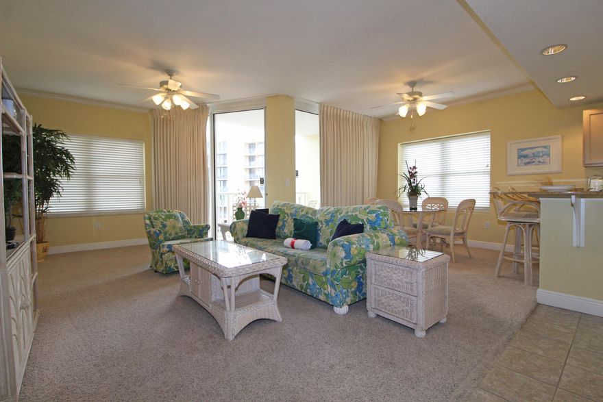 FIND YOUR PLACE IN THE SUN! This beautiful gulfview unit at the immaculately maintained Waters Edge complex won't last long. High ceilings and two sets of sliding doors give the bright and open living area a very roomy feel. Kitchen features include a breakfast bar, granite countertops, and a large pantry/laundry room. The layout of this unit is fantastic! Bedroom and living area are joined by the sizable bathroom. The comfortable master bedroom is spacious and quiet. Waters Edge has lots of amenities including a three story parking garage, huge seasonally heated pool, grilling area, game room, and fitness center. Call today for your private showing!