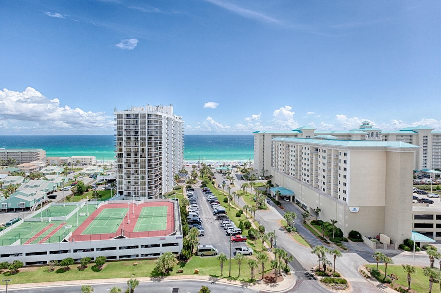 Upgraded with tile flooring, stainless appliances, granite counters. The largest two bedroom floor plan at 1230 SqFt featuring an expansive Master Suite with a huge master bath, a guest bedroom, and a private bunk room. This condo is turn key and ready for it's new owners. High end furnishings with custom draperies. Seascape is a resort unlike any other with over 2000 feet of beach, On-site Golf, Tennis, Watersports, Bike Rentals and several restaurants including our locals favorite, Whales Tail Beach Bar & Grill. Don't miss out on this stunning unit!