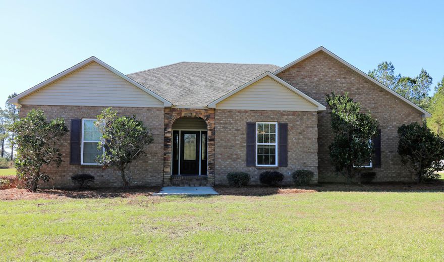 The Bells and Whistles Are Going Off! As you drive down the long private drive you will feel like it's a Thomas Kinkade painting. You will find 13.75 acres of beautiful lush land to include a serene cypress head pond. Enter this gorgeous home to be greeted with wonderful details everywhere. The living room will inspire you with a wood burning stone fireplace, trey ceiling with rope lighting, and french doors to the back porch. View the glorious kitchen with a copper farmer's sink, granite counter-tops and island, and 42'' custom wood cabinets. The master suite features a large full bath with tiled shower boasting seating and double shower heads, dual vanity, and walk-in closet. Bonus: laundry room, Jack and Jill bath for additional bedrooms, and walk-in closet in all bedrooms. Attic has extensive flooring for storage or possible additional room. Location is prime as the home is on a road with many beautiful newer homes. Within approximately 50 minutes to the Northwest Florida Beaches International Airport and "The World's Most Beautiful Beaches" of Panama City Beach. Only 5 miles to the tallest waterfall in Falling Waters State Park.  