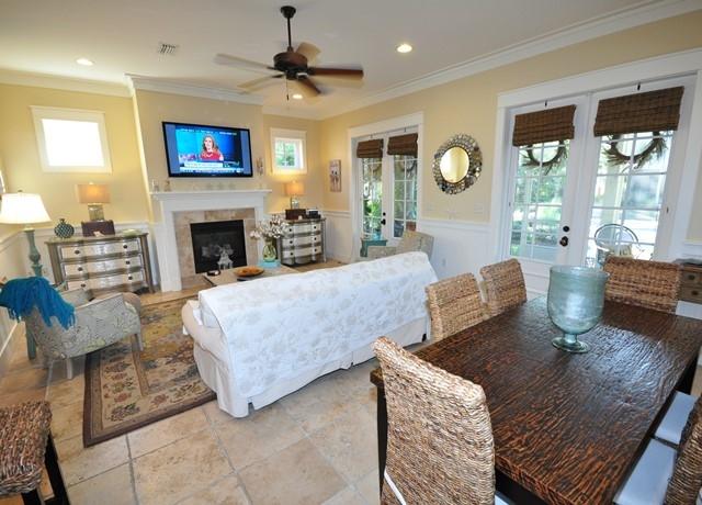 Charming Florida cottage in pristine condition, within The Bungalo's at Sandestin Golf and Beach Resort. Never been rented. Being sold FURNISHED! Located at the end of the cul de sac, yet still walking distance to the neighborhood pool. Would make a wonderful primary residence, 2nd home, or investment property. Screened front patio leads to two sets of French doors to enter the home. First floor master bedroom, with 2 additional bedrooms upstairs. Granite counter tops, travertine flooring, crown molding, gas fireplace, with gorgeous furnishings. This home is turn key. Landscaping is included in the association dues. Just a short golf cart ride to the beach, the activities of The Village of Baytowne Wharf or Grand Boulevard.