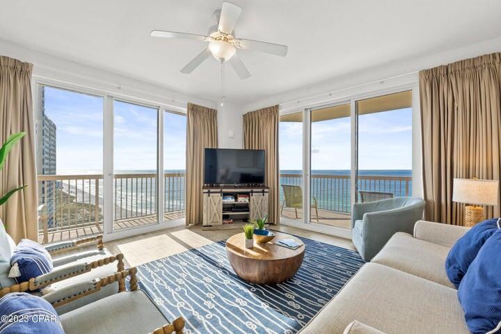 Absolutely fantastic, premier condo in the coveted Sunrise Beach development. Eastern facing corner unit! This exceptional, 1,577s.ft. condo lives like a house but comes with all the benefits of owning a condo. Open and bright with fresh paint, raised ceilings, two large sliding glass doors in living area, and plenty of windows in the kitchen and bedrooms. Conveys with new luxurious beach inspired furnishings and artwork that welcome you to lie back and relax with views of the beach and emerald waters of the Gulf of Mexico. The kitchen features upgrades such as raised panel cabinets and, new solid granite countertops. Upgraded with Plank Tile throughout and new custom cabinets and counter tops in all three bathrooms as well!