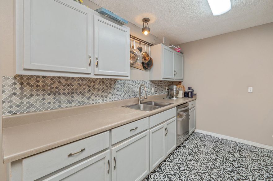 This home could qualify for $65,000 in grant money that could be used for closing costs or to pay down the purchase price. Sitting on  on nearly half an acre. Brand new flooring in the HUGE master bathroom. The kitchen features upgraded stainless steel appliances. Freshly painted front and back doors, and  new shutters. This house has NO carpet.