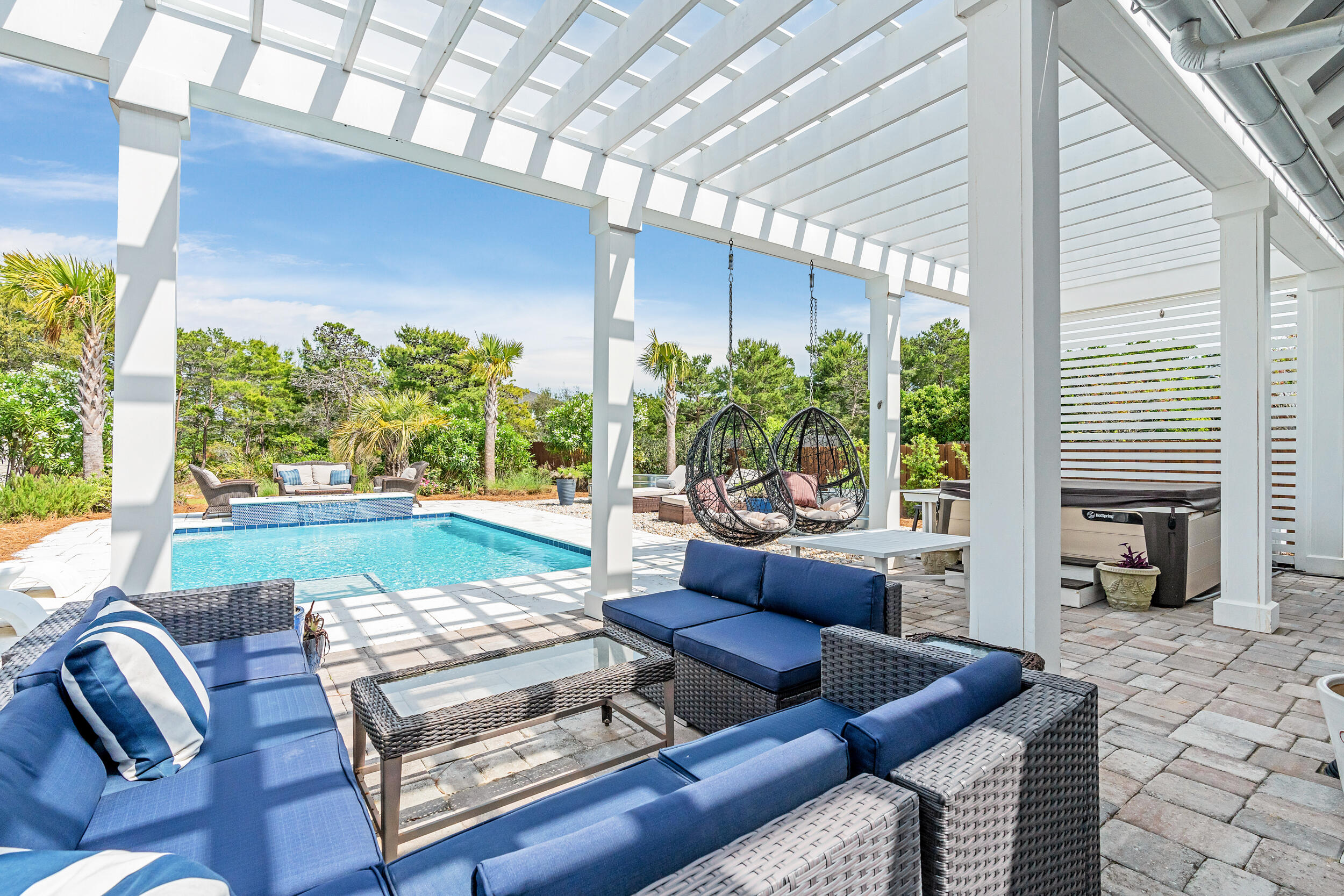Welcome to 24 N Deno Drive -- a beautifully renovated beach retreat nestled on an oversized lot just a short stroll from the vibrant heart of Gulf Place and the sugar-white sands of the Emerald Coast. This thoughtfully updated home features fresh paint throughout and a smart, spacious layout with three main-level bedrooms, each with its own en suite bathroom, offering both comfort and privacy. Upstairs, you'll find an additional bedroom with a full bath and a generous attic storage area, ideal for stashing beach gear or seasonal decor.Step outside into your own private oasis -- a backyard designed for true coastal living. Enjoy the brand-new in-ground pool complete with an attached fire pit feature, perfect for entertaining or unwinding under the stars. Relax in the above-ground hot tub tucked beneath a beautiful backyard terrace, or kick back on the cozy covered back porch. With plenty of peaceful spots to lounge and soak in the natural surroundings, this home offers the perfect balance of relaxation and style.
Homes on this charming street rarely come on the market, making 24 N Deno Drive a truly special opportunity. Whether you're looking for a full-time residence, vacation getaway, or short-term rental investment, this coastal gem delivers on location, luxury, and lifestyle.