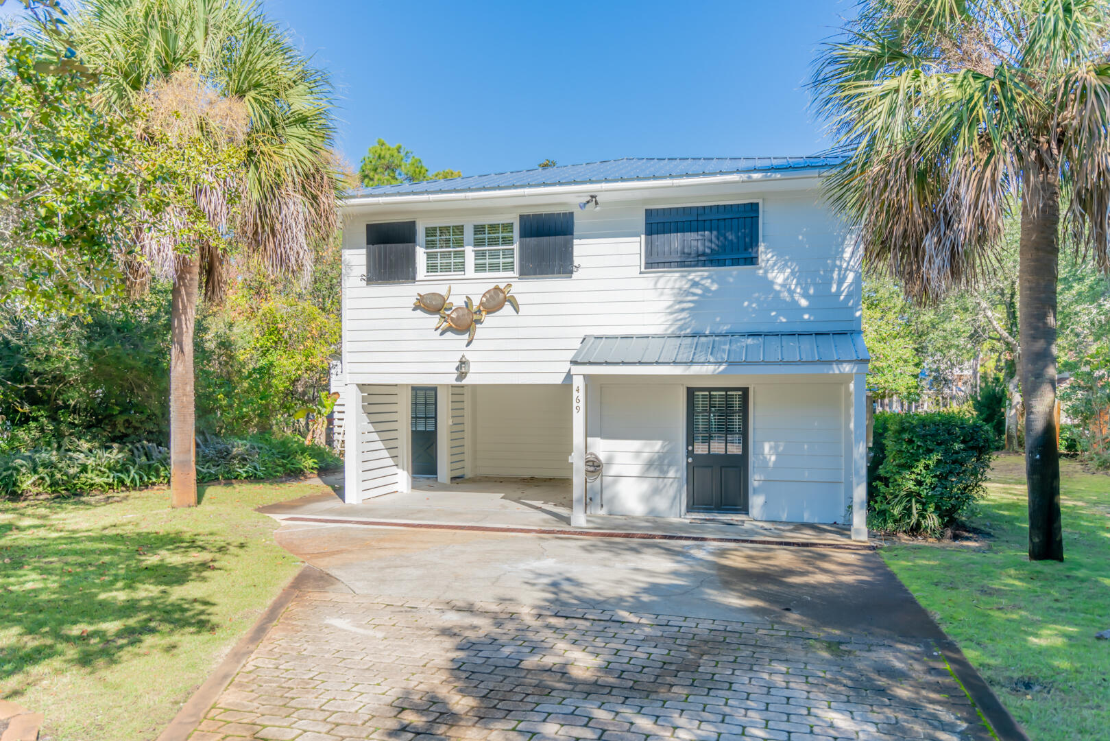 Magnolia at the Gulf is a 5 bedroom, 3 bathroom home nestled amongst a canal extension of Eastern Lake located South of 30A in Seagrove Beach. This home is a perfect place to live or vacation the good life! With two living rooms, two kitchens, large lot and easy access to the most beautiful beaches the emerald coast has to offer, you can either boat, bike or walk less than a 10 minutes to the sugar sands. Currently, this home is a vacation rental.