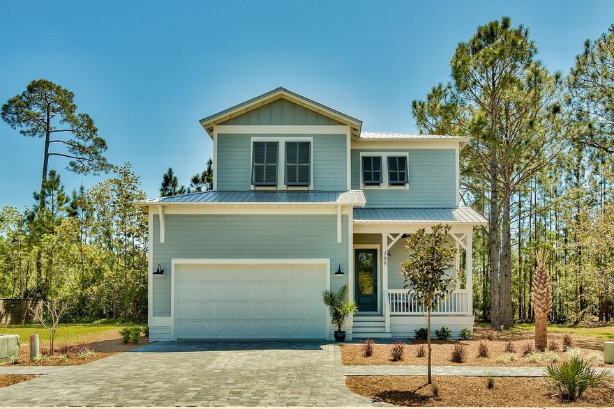 NEW CONSTRUCTION/ 4 bedroom with Master down in Hidden Grove, a gated community with a fabulous community pool. Home is solidly constructed with 2X6 framing, 8 Ft. Low E impact doors, and Low E impact windows, low maintenance Hardi board lap siding, metal roof, and an impact/wind rated garage door. Forget having to cover your windows in a storm, this is a lock-and-go home. Interiors are upgraded from the typical builder grade home. Home is well insulated, has Energy Star Frigidaire Gallery series appliances. Oven is a slide-in range with convection oven. Hot water heater is 50 gallons. Home is essentially GREEN, and it backs up to a preserve so you will not have neighbors in your backyard. Enjoy your privacy on the covered back porch. Click the ''More'' button and read on. Additional details: Home has two 14 seer energy efficient American Standard HVAC units. This is 4 bedrooms 3.5 baths in 2,488 Sq Ft. and a two car garage. Three additional bedrooms upstairs, one with in suite full bath with tub/shower.  Other two bedrooms share a full bath with tub/shower combo. NO CARPET in this home, all flooring is either hardwood, or ceramic tile flooring. Open concept plan with foyer walls clad in shiplap siding. All cabinets are DLV (Deorative Laminate Veneer full overlay) which is an upgrade and stronger than painted cabinets, with Shaker style door in popular silver grey color. All counter tops are white quartz. Plumbing and lighting fixtures are designer grade fixtures. Ceilings are 10 Ft. high throughout. First floor hosts the foyer, powder room, kitchen, dining and living room, Master bedroom and bath  and lighted storage under the stairs. Full walk-in laundry is on the the first floor. Laundry has 42" cabinets and deep laundry sink with hand spray to wash your pets. Closet space galore in each bedroom. Home has a covered porch both front and back with maintenance free Trex type decking and exterior fan. All landscaping has heat tolerant native grasses, plants and trees. Lot irrigated and covered in pine straw. You don't have to mow anymore! Community has a large pool with bath houses, and central mailboxes. Your new home is short walking distance to the community pool. It's like having your own private pool without the hassle. There are two public areas to launch your boat just minutes away. Low association dues of $240 quarterly. Gated, attractive community is just a little more than a mile north of the Santa Rosa Beach Wal-Mart, and a short drive to Sacred Heart and Publix. Looking to work or play on 30A. You have easy access to 98 with a stop light at W. Hewitt and Hwy 98. You can be on the west end of 30A in 5 to 7 mins. Builder purchased extended warranties on all kitchen appliances. Property in flood zone "X", no flood insurance required. Not in COBRA, can do VA and FHA lending. Home being sold unfurnished. Buyer to verify any and all information important to buyer. There is a one time capital contribution fee of $160 and a $250 transfer fee to the HOA.