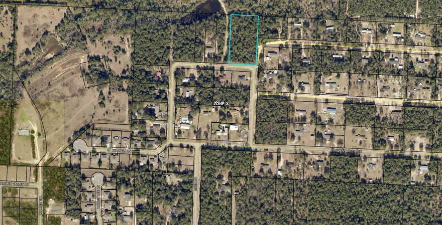 SELLER MOTIVATED, MAKE AN OFFER! Spread out and built your family compound on this priced to sell a 2.1 acre parcel in X Flood zone on paved county road no HOA. There are build out requirements/restrictions in this neighborhood located East of Crestview.