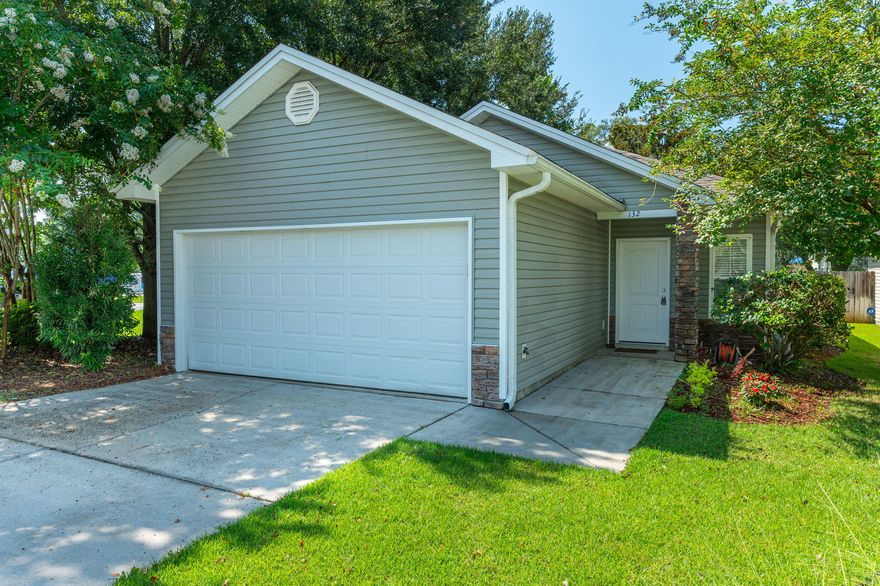 Welcome to this beautifully landscaped 3-bedroom, 2-bath single-family home in the heart of Niceville. With its inviting curb appeal, vinyl siding with stacked stone accents and low-maintenance design, this home offers comfort, style, and practicality.Step inside to a warm and welcoming living room featuring hardwood floors, recessed lighting, a ceiling fan, and plush carpeting that continues into the bedrooms. The kitchen is both functional and inviting, showcasing stone countertops, a tiled backsplash, upgraded maple cabinetry, stainless steel appliances, and a cozy eat-in area perfect for casual meals or a small dining setup.The primary suite includes soft carpeting, a ceiling fan, and an extra-long vanity with cabinetry that matches the kitchen for a cohesive design. The attached bath features a glass-enclosed walk-in shower. The two additional bedrooms are also carpeted and share a full bathroom with a matching vanity and a shower-tub combo.

Additional highlights include washer and dryer hookups, a privacy fence enclosing a zero-maintenance backyard, and a small patioideal for a grill or outdoor dining setup. This property offers comfort, convenience, and classic Niceville charm. Contact us today for your private showing!