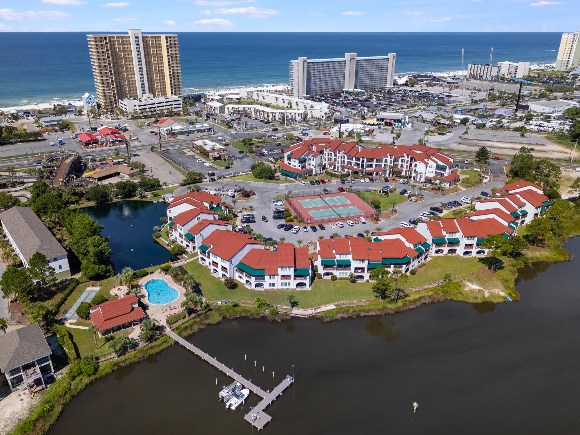 Discover the ultimate investment opportunity in Panama City Beach with this stunning, fully furnished short-term rental property! This wonderful gated community is situated on the intercoastal water way with its own private boat dock for residents and guests. Owners and guests can enjoy the pristine swimming pool, sauna or tennis courts. The unit is located on the second floor that includes a glass elevator for effortless access. One of the few that has a new AC unit and an in unit washer and dryer. Perfect location 500 steps to the white sand on Panama City Beach with restaurants and entertainment outside of the gate. With strong rental history and future bookings already on the calendar, this property is a rare, hassle-free investment. The current owner is happy to assist the new buyer in setting up for success, making this an excellent opportunity for both experienced investors and first-time short-term rental owners.
Don't miss out on this short term rental in one of Florida's top beach destinations! Schedule your showing today!