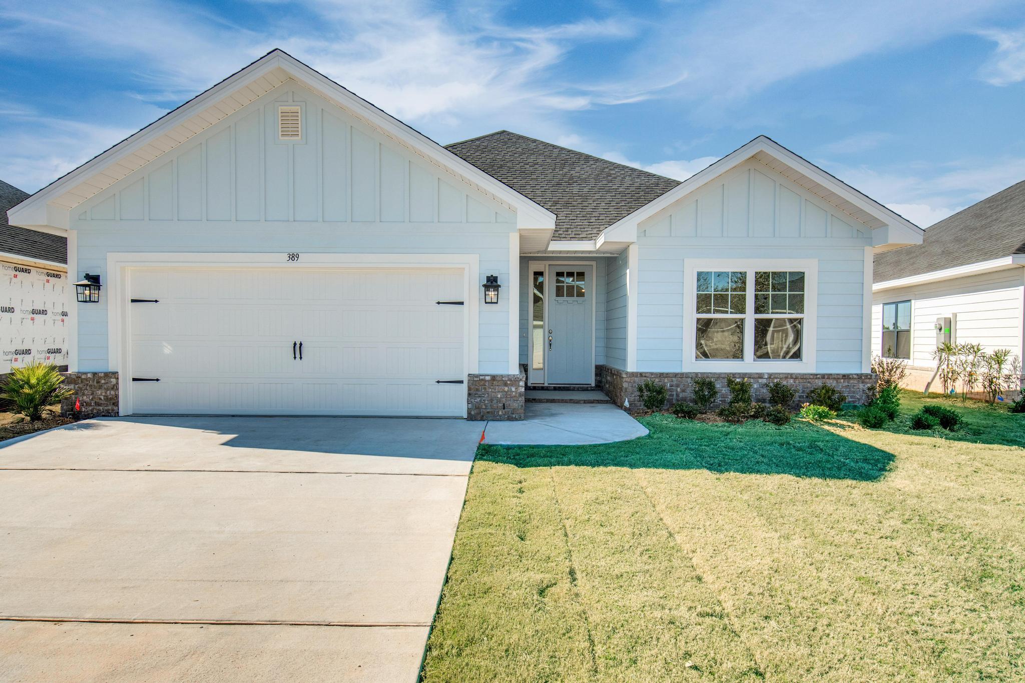 Builder pays most closing costs when a preferred lender is used. In addition, this home is eligible for a 4.99% fixed loan rate + $10K in builder flex money to use for builder options, prepaids or remaining closing costs. THE BLUFFS is a new Freeport subdivision located just 20 minute from South Walton beaches! Craftsman style, 3 BR/2 BA full brick home. The interior features a minimum ceiling minimum height of 9', with a cathedral ceiling in the Great Room, Dining and Kitchen, and a 10' trey ceilings in the Master Bedroom. 8' tall entry doors, quartz countertops and durable CoreTec Pro Plus LVP flooring throughout. Large master bedroom with large walk-in master closet, separate Garden tub and shower and private water closet.