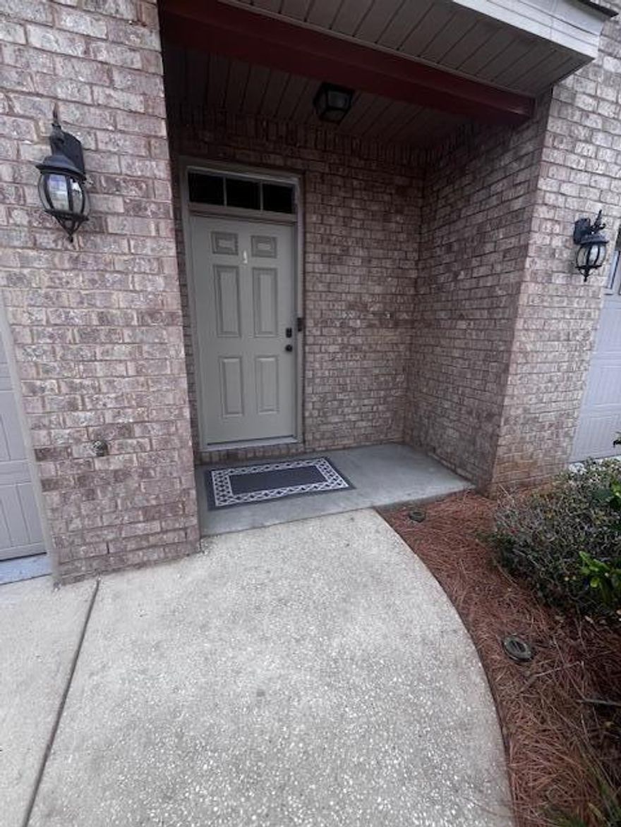 Beautiful and spacious townhome ideally located in the heart of Navarre! Just minutes from Hurlburt Field and the stunning beaches of the Emerald Coast, this well-maintained home offers both convenience and comfort in a highly rated school district.Built in 2017, this townhome features 3 bedrooms, 2.5 bathrooms, and a 1-car garage. The interior includes granite countertops, luxury vinyl flooring, stainless steel appliances, and fresh paint throughout. Additional conveniences include washer and dryer, plus window blinds throughout the home.Enjoy outdoor living on the private back patio, perfect for relaxing or grilling.The community offers sidewalks, a playground, and a community pool, creating a welcoming neighborhood atmosphere.Available now. One month security deposit required.
