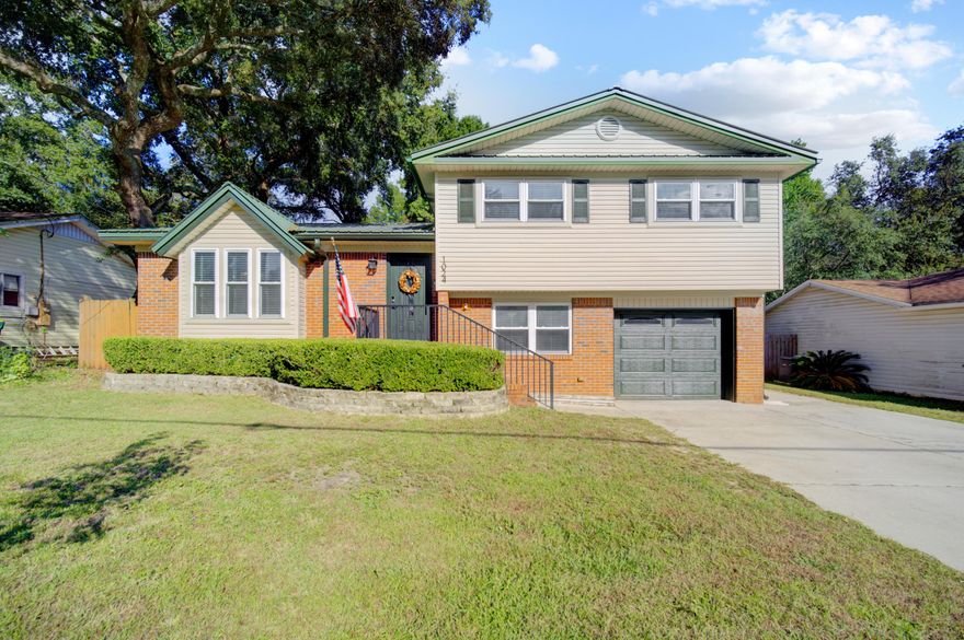 This beautifully updated pool home on charming Juniper Avenue has been transformed! The kitchen was opened up  to the dining room and a large island was added, new cabinets in kitchen, new LVP flooring, fresh paint, scraped ceilings, baseboard, and much more.  No carpet at all.  The kitchen shines with granite countertops, and stainless steel appliances.  Living spaces are bright and inviting, and a huge bonus room on the bottom level offers endless possibilities--office, playroom, game room, or even a future owners suite.  Outside, enjoy the private backyard with an in-ground pool, screened porch with new flooring, fenced yard, and storage shed. A remodeled half bath by the pool adds extra convenience.  Metal roof (2010), water heater (2021, HVAC (2014)