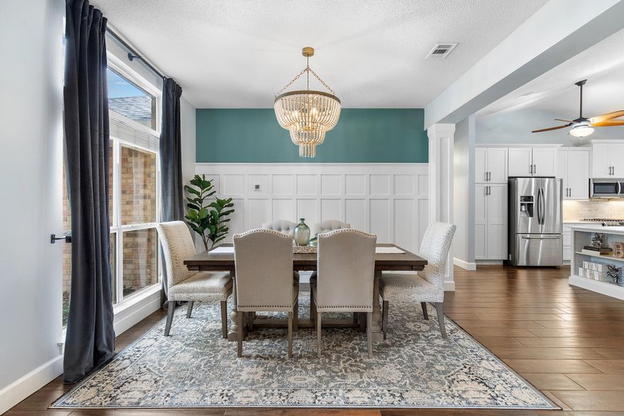 BRAND NEW ROOF installed October 2025! Discover your piece of paradise in the heart of Destin. Set in the desirable Indian Lakes community, this 3-bed/2-bath home pairs a split-bedroom layout with an airy, vaulted great room for easy everyday living and entertaining. The redesigned kitchen features white shaker cabinetry, quartz counters, an oversized island, and a full stainless suite, including a 5-burner gas range with dual convection and a French-door refrigerator with dual ice makers. A remote-controlled gas fireplace anchors the living space. Durable wood-look tile runs throughout the main areas, and both baths showcase light cabinetry with quartz tops. Practical upgrades include a gas tankless water heater (2017) and an updated A/C (2013). Outdoors, enjoy a cov