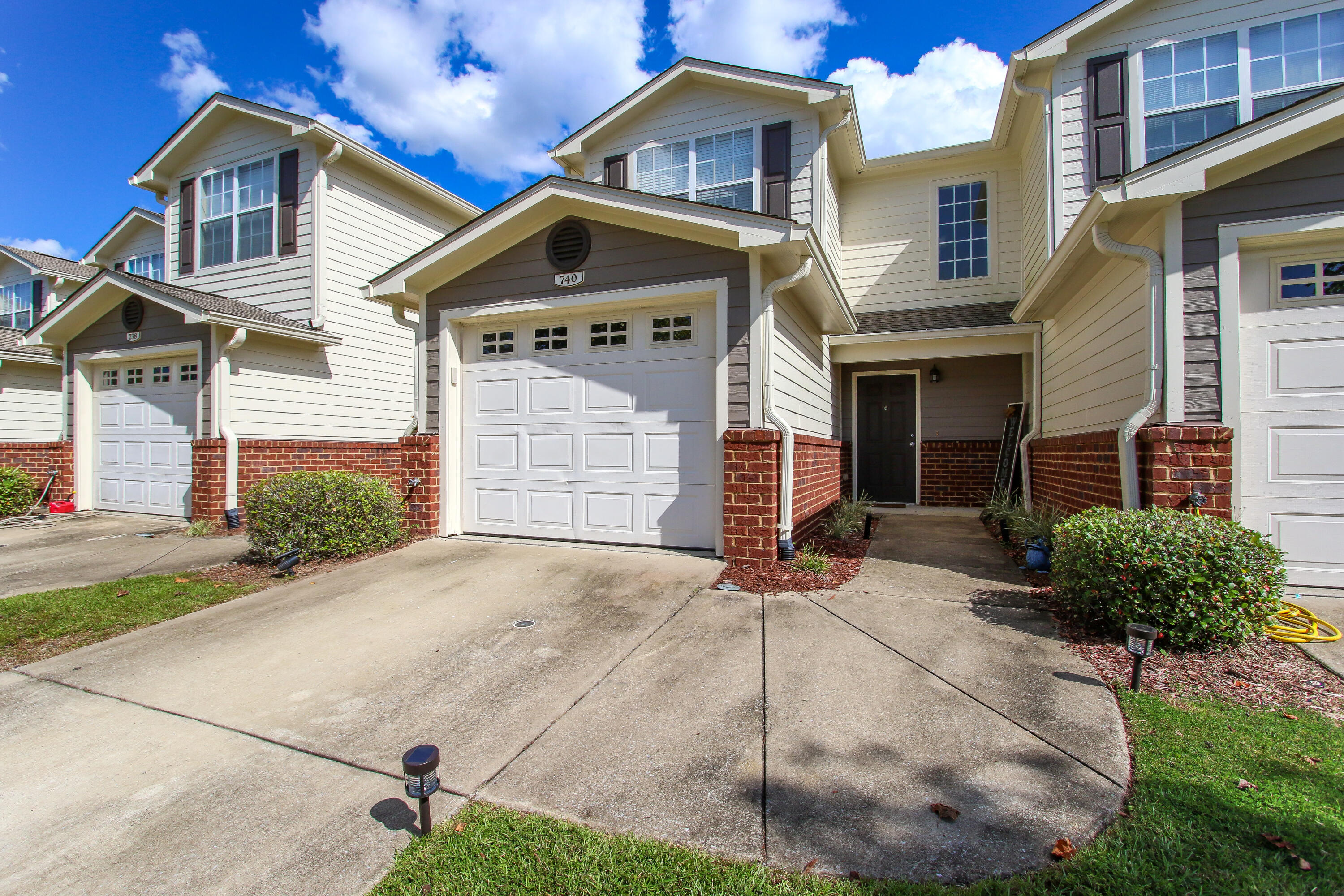 Great location in Eagles Landing, a well maintained and popular enclave with easy access to Hwy 85/I-10. This sidewalk community boasts stylish townhomes surrounding an impressive common space with resort style pool, club house and playground, all set within rolling green spaces meticulously maintained by the HOA. The unit has 2 master bedrooms, each with their own en-suite bath and large walk-in closet. Recent updates and plenty of additional storage throughout. Washer and Dryer included!