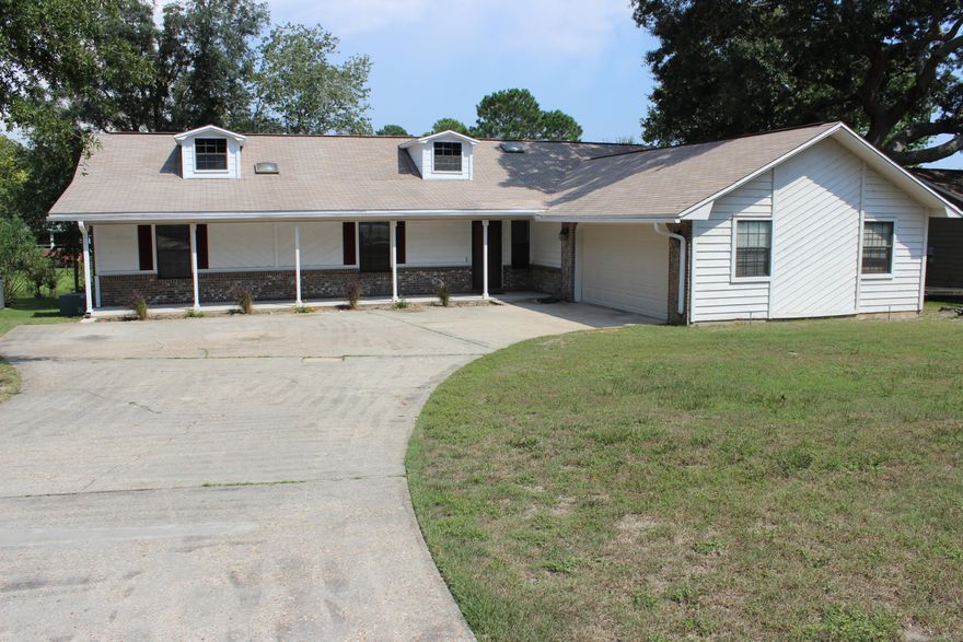 Very nice Bluewater home that sits on a large lot that gently slopes to a small lake. Fresh paint throughout the inside, new carpet in hallway and bedrooms, new flooring in bathrooms, new garage door opener. Home Warranty with Old Republic. This home is move-in ready.