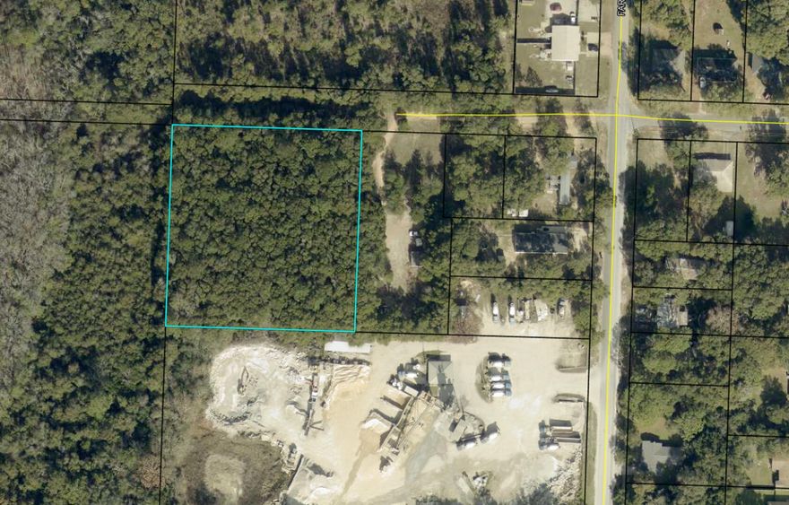 Rare in-town acreage opportunity in Crestview, FL. This 1.94-acre parcel on NE Second Ave offers the space without sacrificing everyday convenience. Located on the north side of town, you're just minutes from shopping, dining, schools, & medical facilities, making daily life easy while still enjoying a private, tucked-away setting.The natural wooded landscape gives the flexibility to selectively clear for your ideal homesite while preserving shade & privacy. Large parcels within city access like this are becoming increasingly hard to find. Whether you're a homeowner planning a custom build, a builder seeking a strong homesite, or an investor looking for land in a growing area, this property delivers location, usability, & long-term potential in one package. Ready to bring your vision?