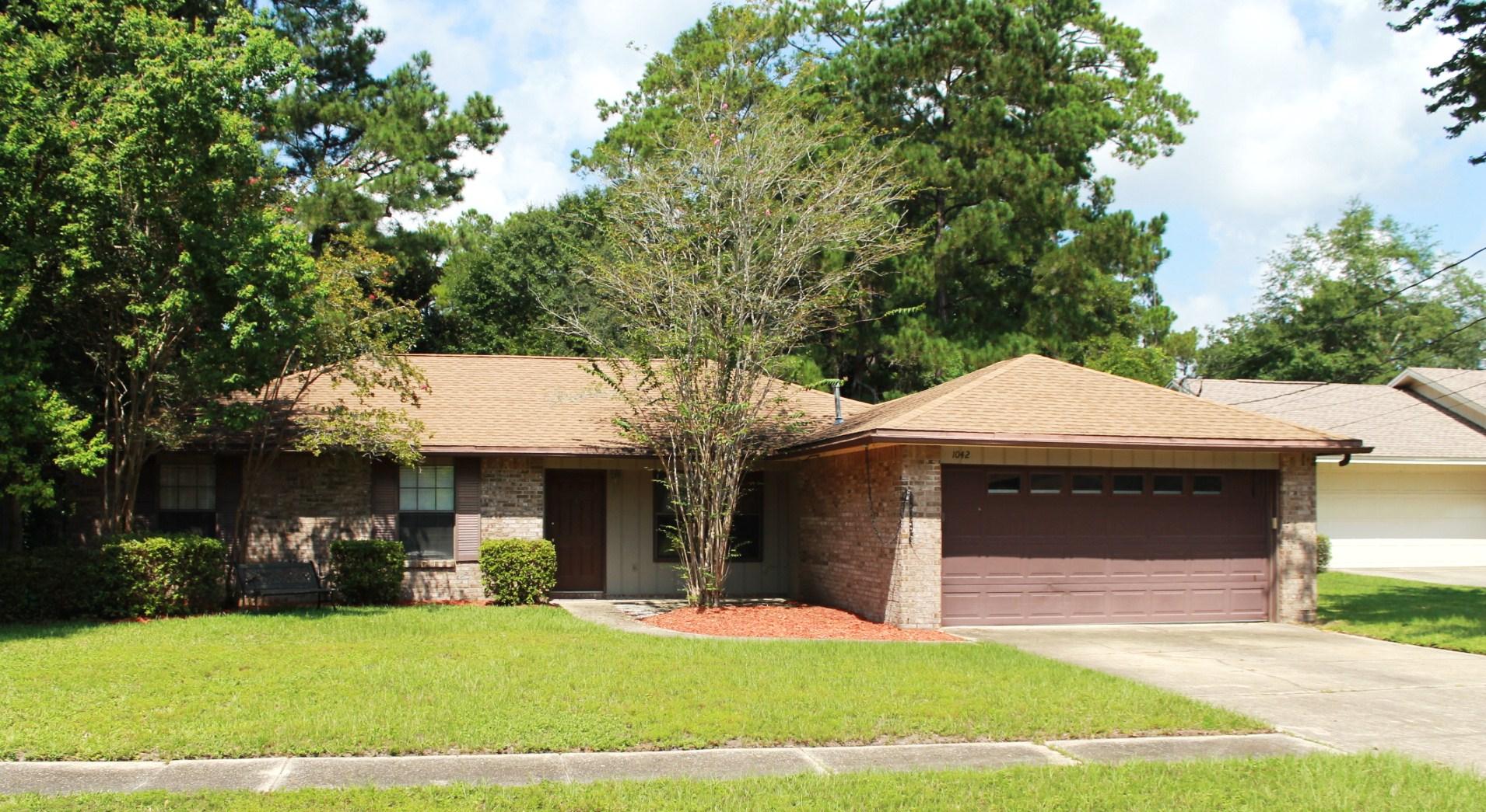 Fantastic All Brick, 3 bedroom, 2 bath home with Den/Office on a large lot located in a cul-de-sac within the Pinewood Estates subdivision. There is a ''Nature Area'' to the left of the home which gives this home an incredible amount of privacy. This home would make a Great First Home or Rental Investment. The sellers have put in new carpet in the nicely sized bedrooms. There is also wood burning fireplace in the large family room. The kitchen has a new stove/oven. This home is move in ready. There is also a screened-in porch which opens up to the large back yard with mature trees. There is also a storage building/shed in the back yard. This home is a must see!! Buyer to verify all dimensions.