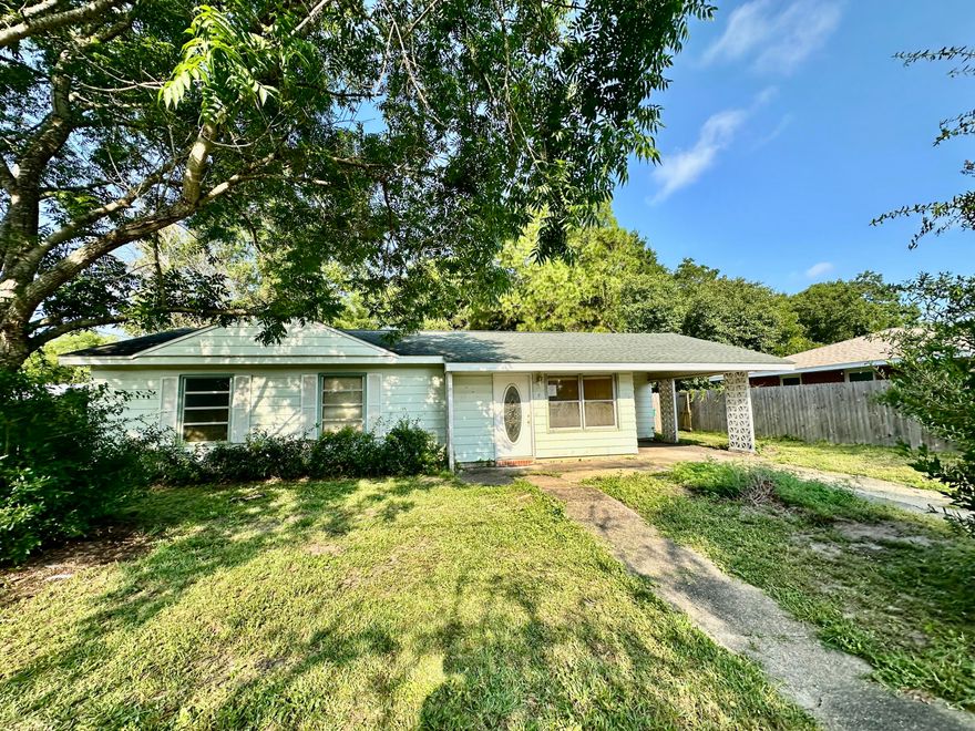 REO. Great opportunity located close to Schools, Shopping, Restaurants and more! Not only does the home have a Living Room and a Huge Family Room with a Fireplace but it also has a Large Laundry area and all sits on a HUGE LOT!!  Lots of opportunity with this home!  Please call for more information.