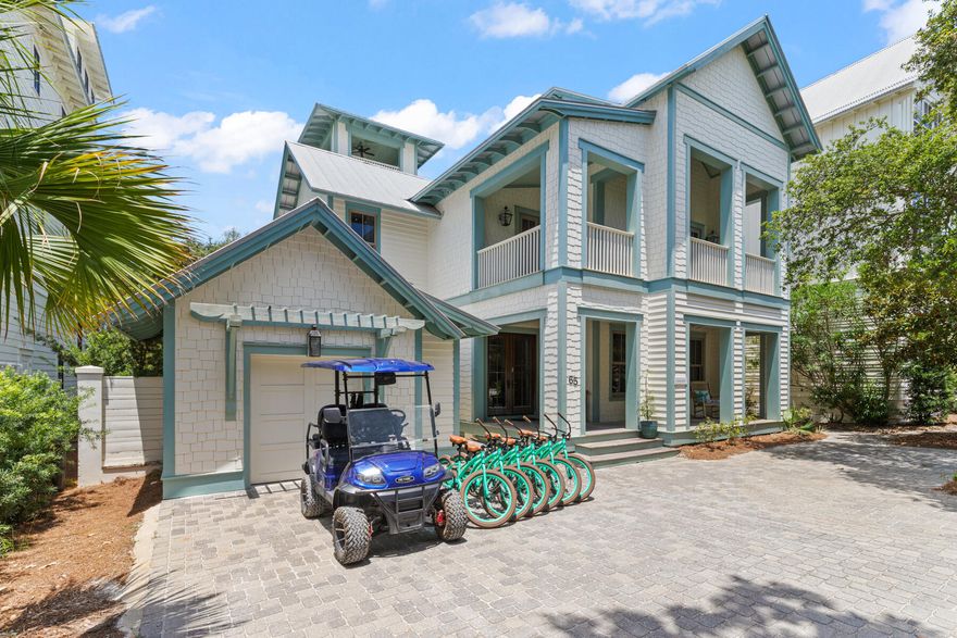 A timeless Old Seagrove retreat just steps from the Gulf, this spacious beach home offers the rare combination of classic coastal character, exceptional location, and outstanding rental potential. Nestled beneath mature trees on a quiet Seagrove street, the property sits just 350 feet from beach access and one block from Scenic Highway 30A, placing you within an easy walk or bike ride of Seaside and some of the most beloved dining and shopping along the Emerald Coast. Adding to its appeal, the property benefits from no HOA dues, a rarity in this highly desirable area.Inside, the home blends warm architectural details with relaxed coastal design. Beamed pecky cypress ceilings, white oak floors, and crisp shiplap walls create an inviting interior that feels both refined and comfortable. Natural light fills the open-concept living and dining areas, while the spacious kitchen with premium appliances and generous seating is designed for gathering after long days at the beach.

Spanning three levels of living space, the layout offers room for everyone to spread out and relax. A third-floor bonus living area with kitchenette provides an additional lounge or game space, while the rooftop tower with wet bar captures views toward the Gulf, creating a unique spot to unwind and take in the coastal breeze. With accommodations for up to 16 guests, the home is ideally suited for large families and vacation groups alike.

Outdoor living is just as inviting. A large covered porch with outdoor kitchen overlooks the private pool, offering a natural gathering space for afternoons in the shade and evenings under the stars. Thoughtful features throughout the home include an elevator, three washers and dryers, garage parking, and generous storage, all designed to make extended stays and rental management seamless.

The location places you right in the center of the 30A lifestyle. The Surfing Deer, Seagrove Village Market, Cowgirl Kitchen, and Seaside Town Center are all within easy reach, while the surrounding communities of WaterColor, Grayton Beach, Alys Beach, and Rosemary Beach are just a short drive away.

This beach home is offered fully furnished with six bikes and a four-seat golf cart included, creating a true turnkey opportunity. With rental projections exceeding $200,000 per year, this property represents a compelling blend of lifestyle and investment in one of the most sought-after areas along Scenic Highway 30A.