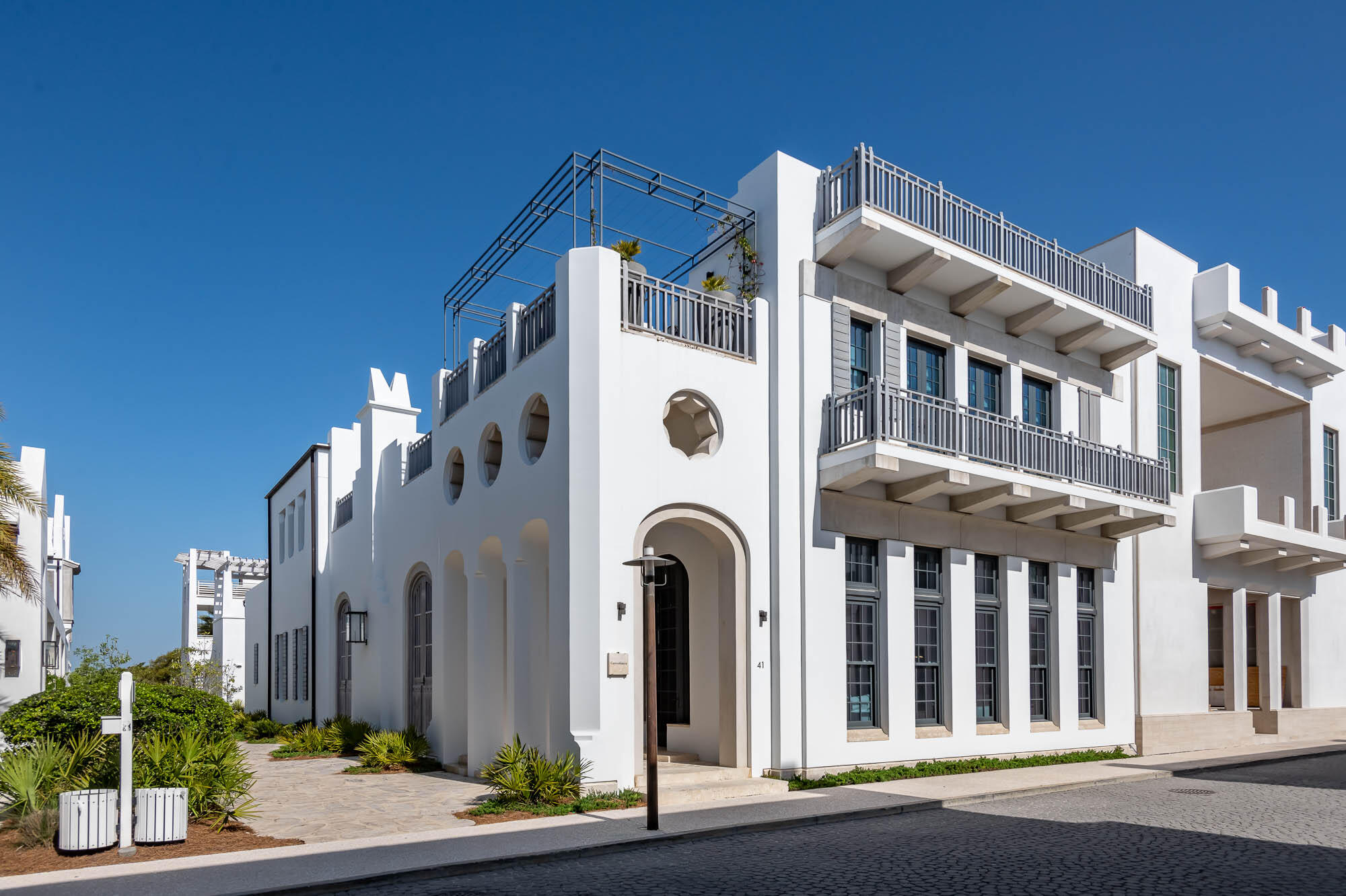 Welcome to the renowned home listing of 41 Kings Castle Court, designed by the award-winning architectural firm KVA Architecture. This luxurious residence is located south of the Scenic Highway 30A in the highly sought-after town of Alys Beach, offering easy access to the breathtaking Gulf of Mexico.  This exquisite home offers the perfect blend of elegance, comfort, and modern design, providing an unparalleled living experience.Spanning an impressive 5,344 square feet of conditioned living space, this home boasts five bedrooms, each with its own private bathroom, providing ultimate comfort and privacy for you and your guests. The meticulously designed interior courtyard creates a tranquil oasis, complemented by an outdoor fireplace and custom brass