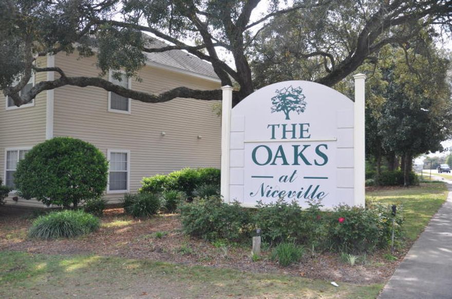 Stand out 2 br/2 bath second floor unit in popular Oaks Condo Complex. Vacant and ready to go. Central Niceville location - close to military bases including Eglin and 7th Special Forces Group. Like new with $22,500 of upgrades just completed including: new stainless steel Kenmore kitchen appliances, new granite counters in kitchen and baths, new sinks and faucets, new door knobs, hinges, bathroom mirrors, towel bars, shower rods, new living room and bedroom flooring (tongue and groove luxury vinyl plank), new window blinds, new interior paint, new stacked washer and dryer, new ceiling fans and new LED light fixtures throughout!! The Oaks complex features a community pool, gazebos and grilling stations. A must see unit for investor or owner occupant.