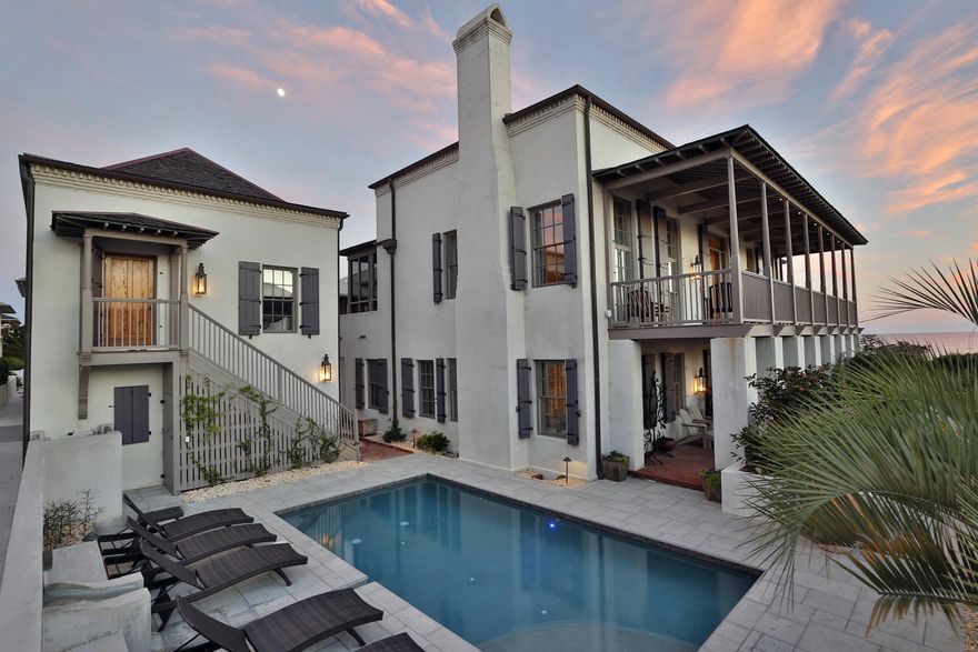 The history of this Rosemary Beach residence begins well before its 2001 completion with a collaboration between noted Interior Designer Phillip Sides and Architect Lew Oliver to create the sixth Southern Accents magazine Decorator Show Home. Presiding over 85 feet of majestically elevated beach front along the emerald Gulf of Mexico waters unique to Northwest Florida, this concrete block construct leaves little to be desired. Located alongside a beach bound boardwalk, the walled property contains a five bedroom main house, one bedroom carriage house over a two car garage, as well as a stone paved courtyard with full size pool, fountain, and lush landscaping. A 2008 redesign evolved the already extraordinary waterfront home to its current state of grandeur.