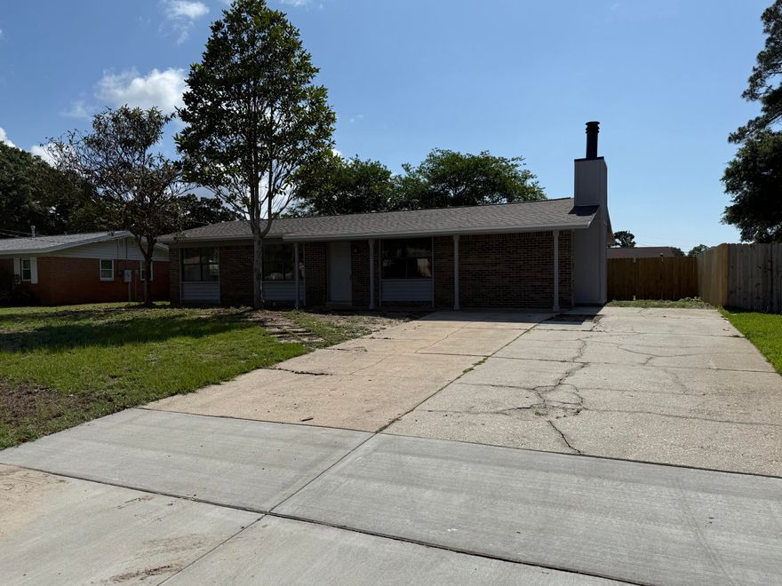 Lots of potential on this rehab project or as a rental for your portfolio. Great location with easy access to Eglin AFB, Hurlburt Field, and just a few miles from our world famous beaches. Property is being sold AS IS. Roof 2025.
