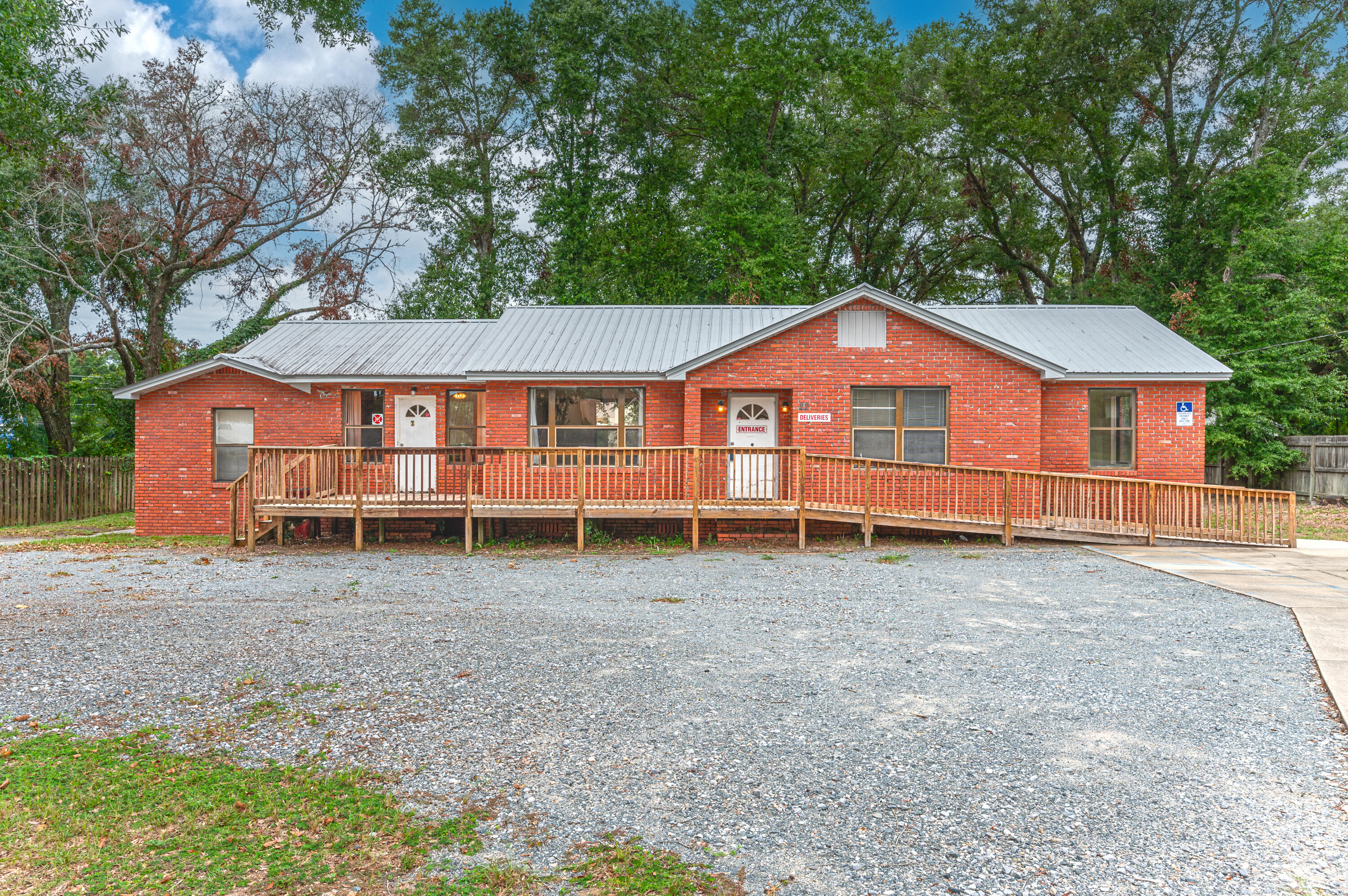 This commercial listing offers a versatile space of around 1900 square feet, with six separate rooms that can be used for various purposes. The property can be divided and rented out separately, making it an appealing investment opportunity. Located near new developments and with easy access to the new bypass, this commercial spot is primed for success with a little TLC.
