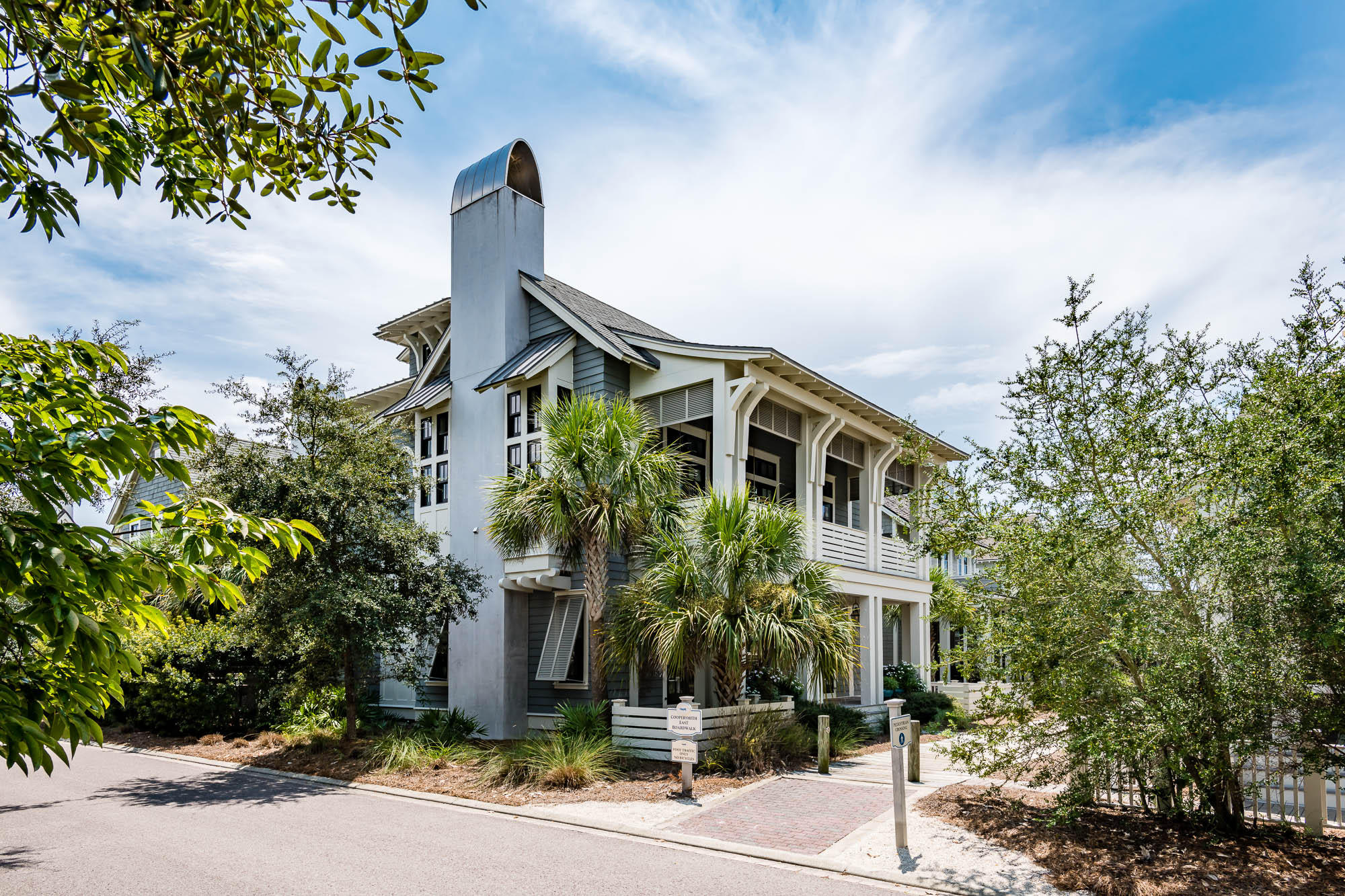 Nestled among the rolling dunes of WaterSound is this elegant turn-key 6 bedroom beach retreat that's perfectly situated on the large corner lot of S. Founders Lane. No detail has been overlooked in this distinguished 4-story home located just steps from the community's secluded white-sand beaches that is being sold fully furnished. Presenting sophistication and flair, this Smarthome impresses from beginning to end with custom furnishings and high end finishes throughout. Wooden pathways connect the picturesque homesteads of WaterSound Beach and this home's sweeping front porch greets you as you enter this welcoming beachside abode. With one-of-a-kind pieces from Phillips Collection and striking Luna Bella lighting throughout, this home kick starts the dialogue with its matchless