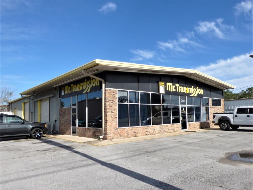 FULLY EQUIPPED TRANSMISSION SHOP - Great office/warehouse/workshop located on Racetrack Road. Office area has a waiting room/reception area, public bathroom, 2 private offices and another office opening to the workshop with a full bath. The warehouse has 3 overhead doors, 6 lifts, a transmission fluid tank, various sized transmission cleaning machines, a rebuild room, a breakroom with a bathroom. Tenant to be responsible for equipment maintenance. Equipment can be purchased separately. GREAT VISIBILITY