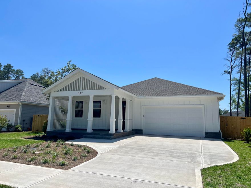 Beautifully designed 3 bedroom, 3 en-suite, full bath home with large living area, two patios, lots of architectural details and more. The spacious home features a nice sized lot with two car garage and lovely slit floor plan. Enter the home to see a large foyer with one bedroom and bath at the front of the house and a second bedroom and full bath opposite. Further in, there is a gorgeous kitchen boating off-white cabinetry, stainless steel appliances, large apron sink, walk-in pantry, coffee bar and more. The large great room has plenty of space for your dining and living room needs. This area also features an electric fireplace with built-ins and another built in cabinet for great storage. The master suite has a walk-in closet and a perfect master bath with separate, double vanity and