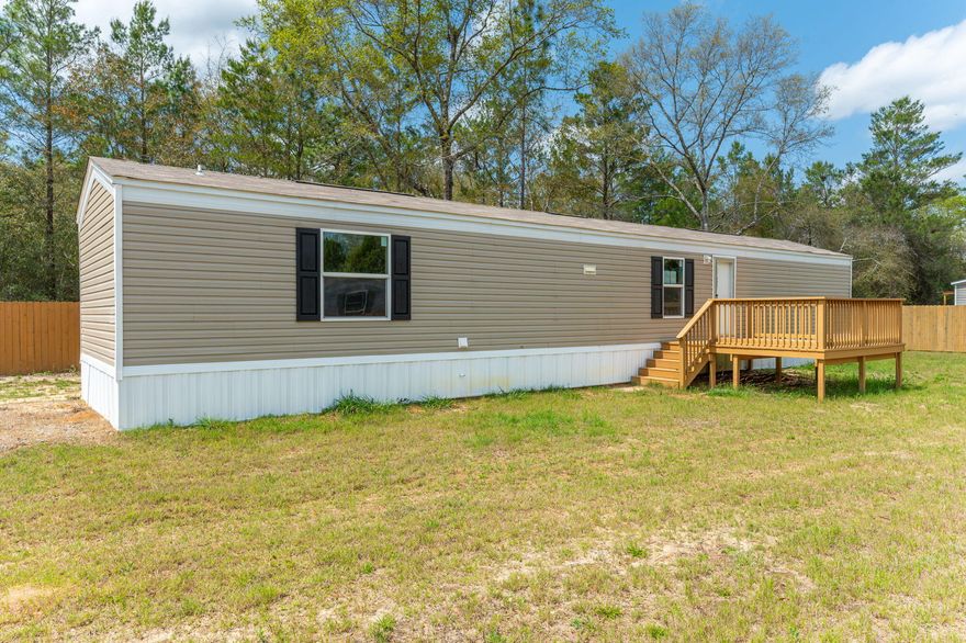 Discover this brand new mobile home in Defuniak Springs, FL. Perfect for first-time homebuyers, this charming 924 sqft residence offers 3 BD and 2 BR in a practical designed for modern living. Step outside to enjoy your morning coffee on the new front deck,. Just a short drive to beautiful Florida beaches and Airforce bases, this home balances peaceful living with accessibility to attractions and employment centers. The thoughtfully designed primary bedroom provides a peaceful retreat while the entire property delivers value and comfort without compromise. Why rent when you can own this move-in ready home with all the essentials for starting your homeownership journey? Schedule your viewing today!Options to help with closing cost assistance with approved credit through various lenders.