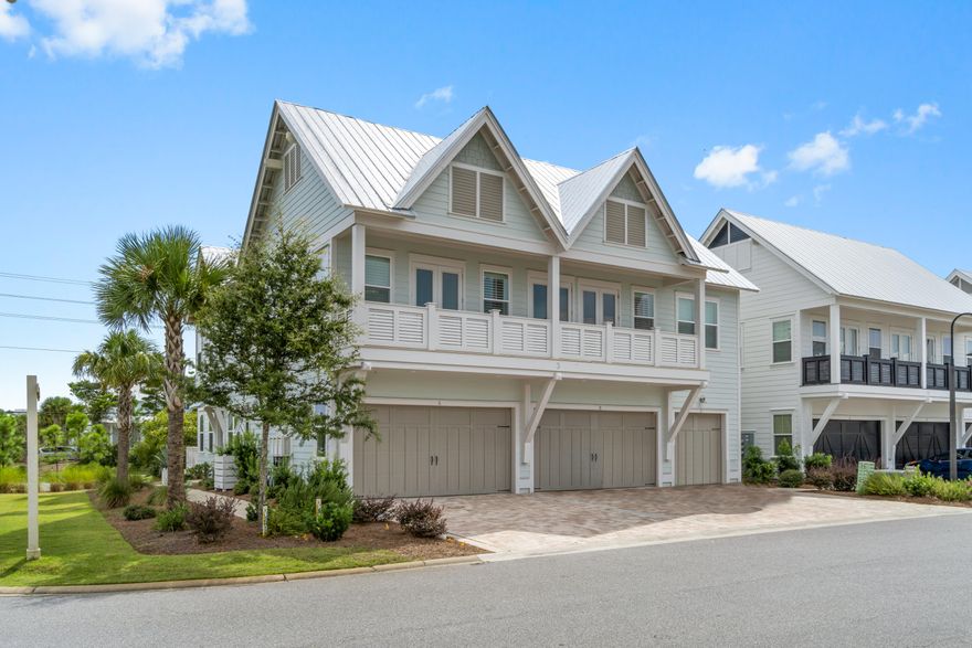 Exquisite end residence in the popular Prominence neighborhood, across the street from WaterSound Beach.  This designer furnished ''Bahamas'' triplex home uniquely offers 3 spacious bedrooms, 2.5 baths, luxurious and elegant living/dining/kitchen combo on the first level opening to an extra large patio with views of the HUB. Other features include a double garage with total parking for 4 vehicles, a 1 minute stroll to the pool and so much more.  Offered furnished and ready for your family to enjoy.