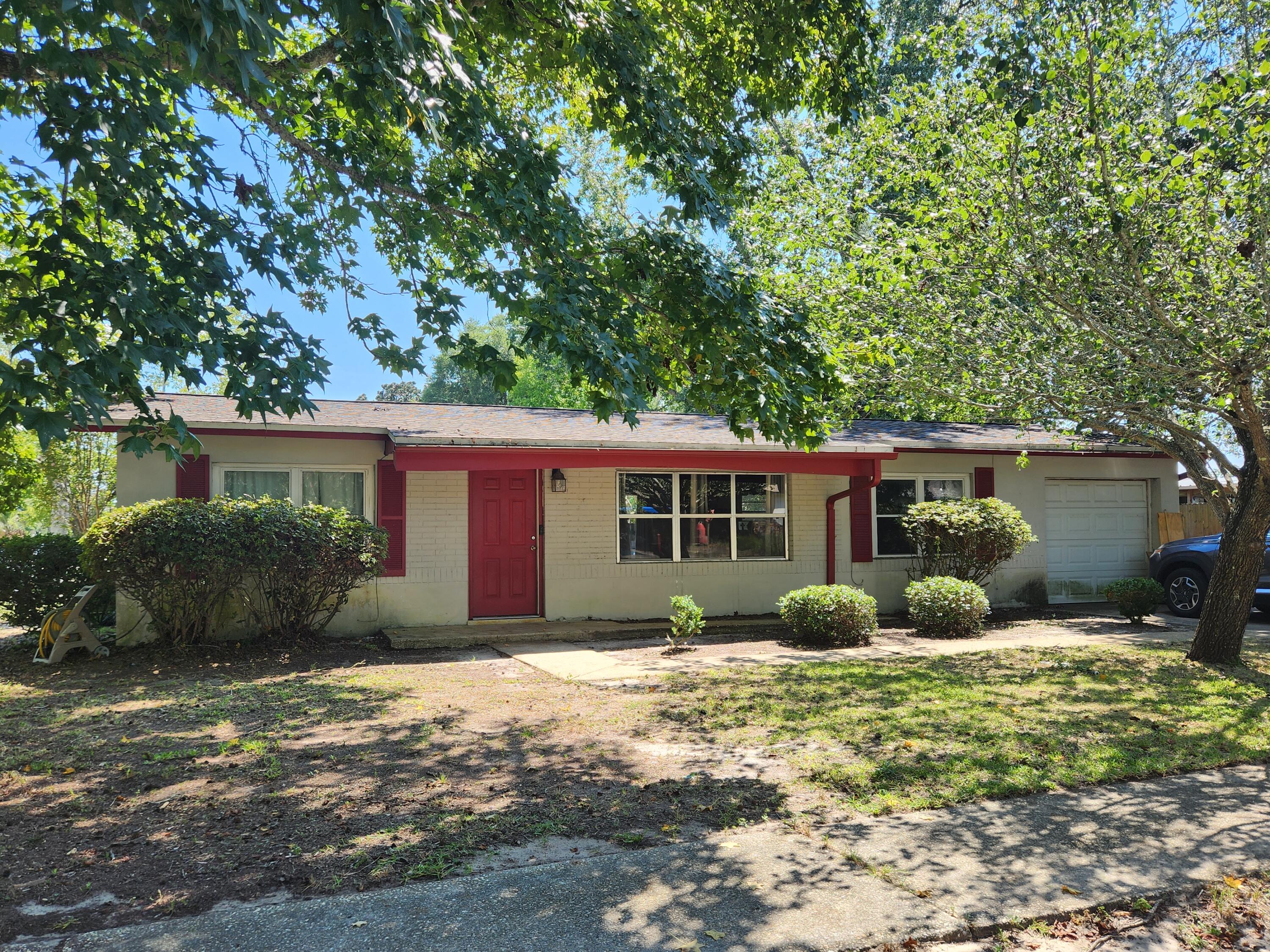 Rehabbers delight!  Discover the untapped potential of this exceptional corner lot property, waiting for your personal touch!  Nestled in a prime location,between Fort Walton Beach and Hurlburt Field, this home offers a unique opportunity for renovation and rejuvenation. Outside there is ample space for landscaping dreams to come true.  Inside, embrace the chance to transform this home into a contemporary masterpiece!  The seller is selling the property as-is, offering you the freedom to make the updates and improvements you desire.  This property is your blank canvas to design the home of your dreams!.  New roof in 2016, New HVAC 2018 with new compressor 2023, water heater 2018, updated plumbing 2021.   Great mid-century Terazzo floors throughout.  Offered As-Is.