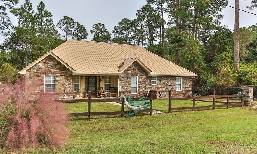 There is so much to love about this custom home in Santa Rosa Beach. Not only are you are on a quiet street with almost a half acre, this home has had many recent upgrades including a new metal roof and gutter system as well as stone on the exterior. Avoid the HOA hassle and enjoy the location of Virgo St being on a couple minutes drive to Beaches, Local Schools, Publix, and the BAY.