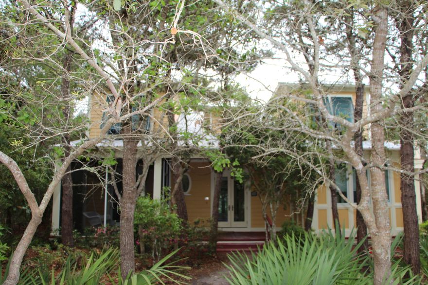 Lovely Grayton Beach boasts the beautiful nature lovers retreat called The Lakeplace At Grayton. Lake Place, is 20 acre property that borders the state park on the east and to the south is 1,475 feet of lakefront on the globally rare coastal dune lake. This home is located close to the pool and community dock. While this home is in a quiet community you are only minutes away from the beach, shopping and restaurants. A master on the main with additional large bedrooms upstairs, each with its own private full bath make this home very desirable for guests. The open living area with gas fireplace and walk out screened porch has good flow for entertaining. Separate dining room for intimate dinners. This home has the only approved fenced yard in the neighborhood. Generator, water softner,