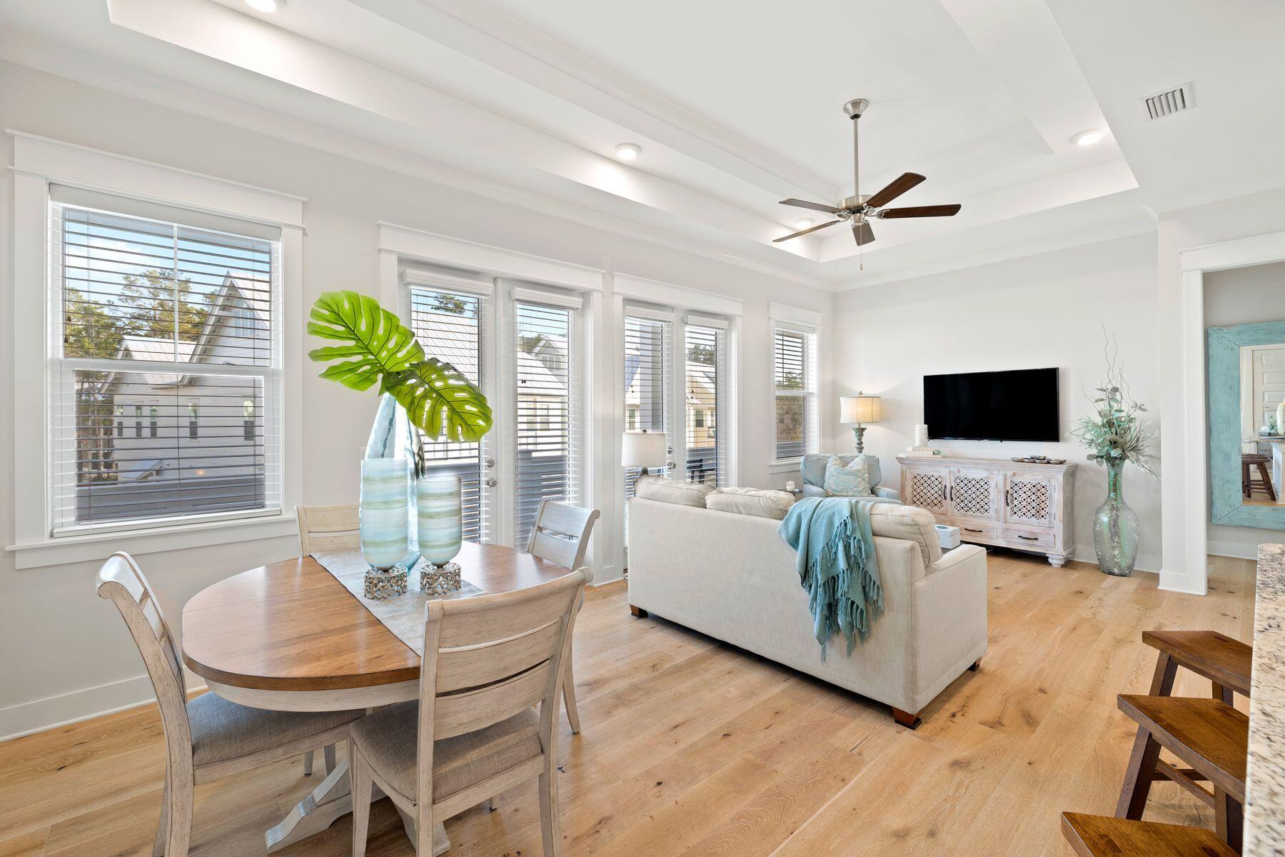 Elegance is found behind the doors of this two-bed, two-bath Prominence townhome that boasts nearly 1,200 square feet of living space, a one-car garage and included luxury furnishings. Turnkey and ready to go for the 2022 beach season, this unit includes a six-passenger golf cart and access to a community pool with cabanas, fitness center, grilling pavilion and seasonal beach shuttle. 2021 gross rental income surpassed $83,000. All phase four townhomes at Prominence are appointed with soft-close doors and drawers, upgraded Electrolux appliances with French door refrigerator and farmhouse sink. Other enhancements include wood flooring, a rainmaker shower head in the owner's en suite bath and keyless entry. Every detail from a sleep sofa to breakfast bar to flatscreen TVs has already been